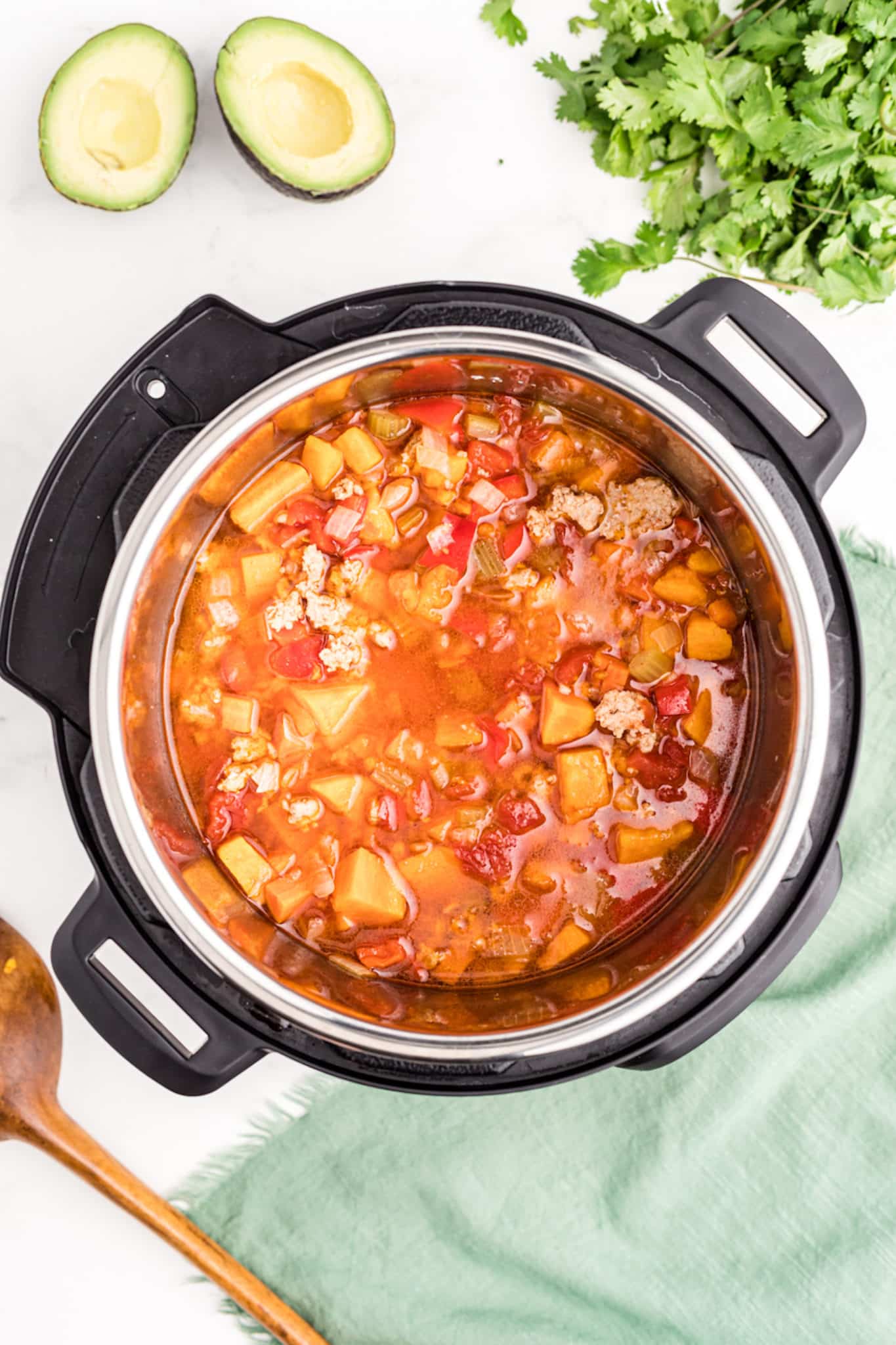 cooked turkey and vegetable stew inside instant pot