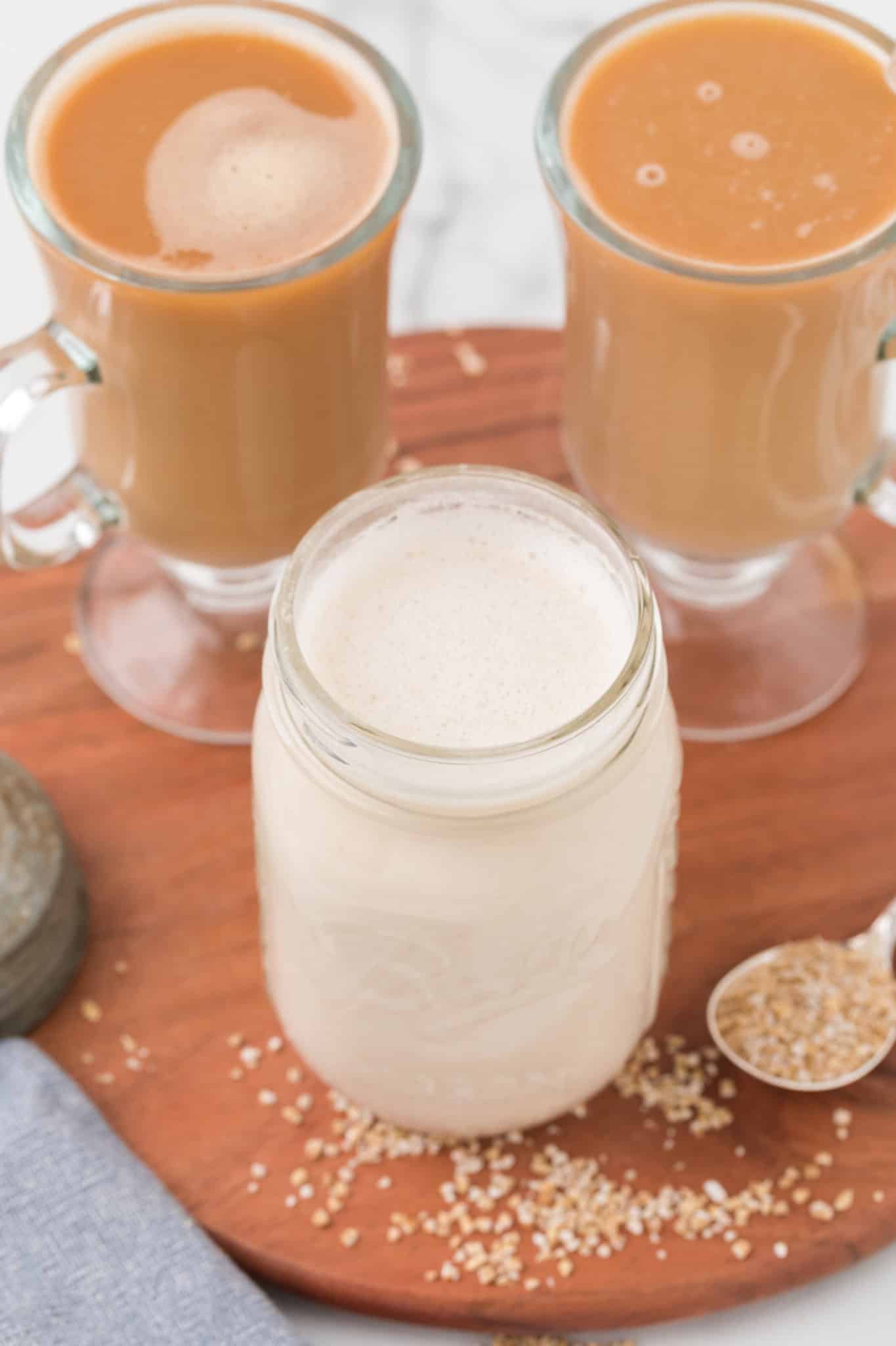 oat milk creamer with two coffees