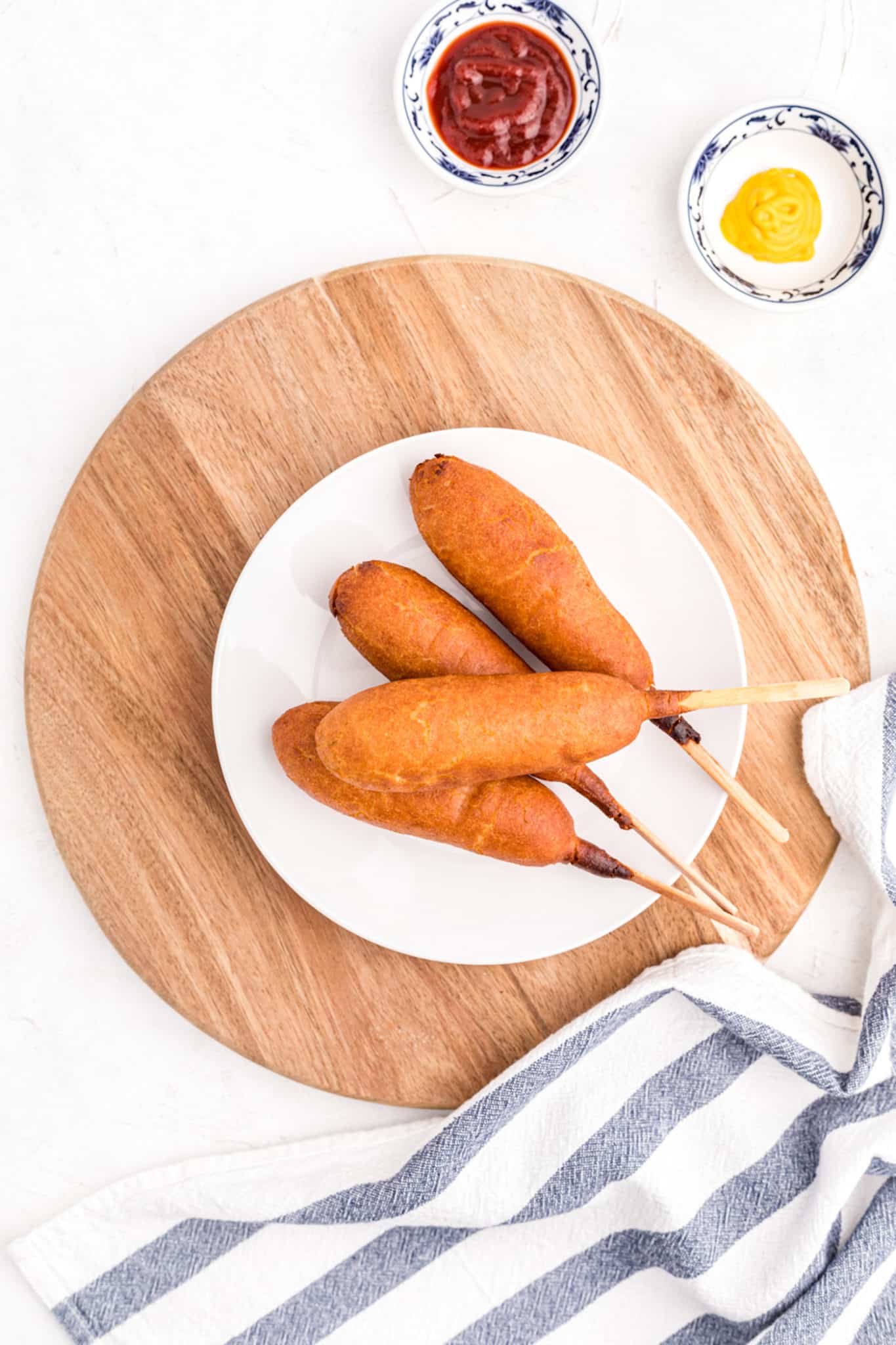 a plate of air fryer corn dogs.