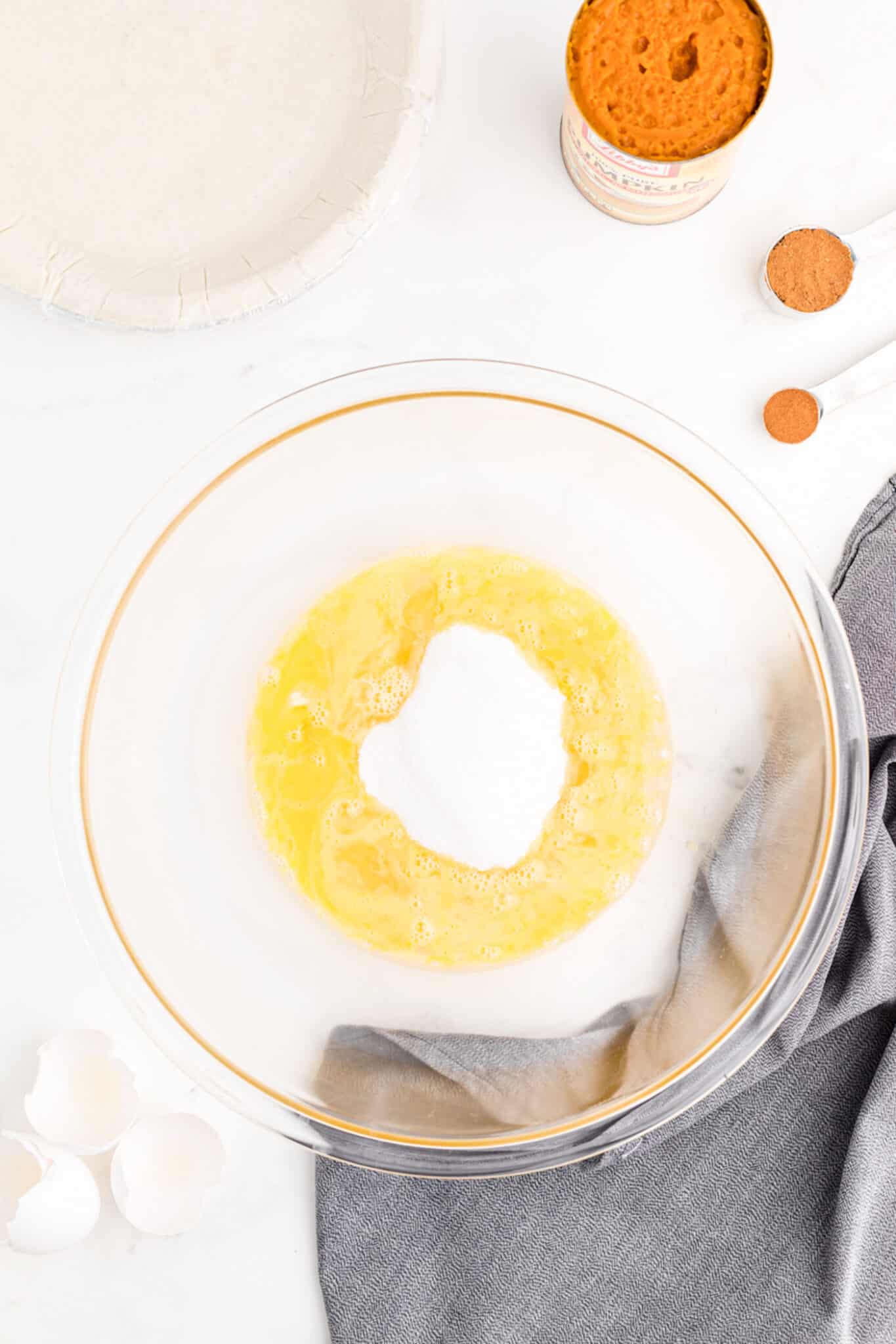 sugar and eggs in bowl.