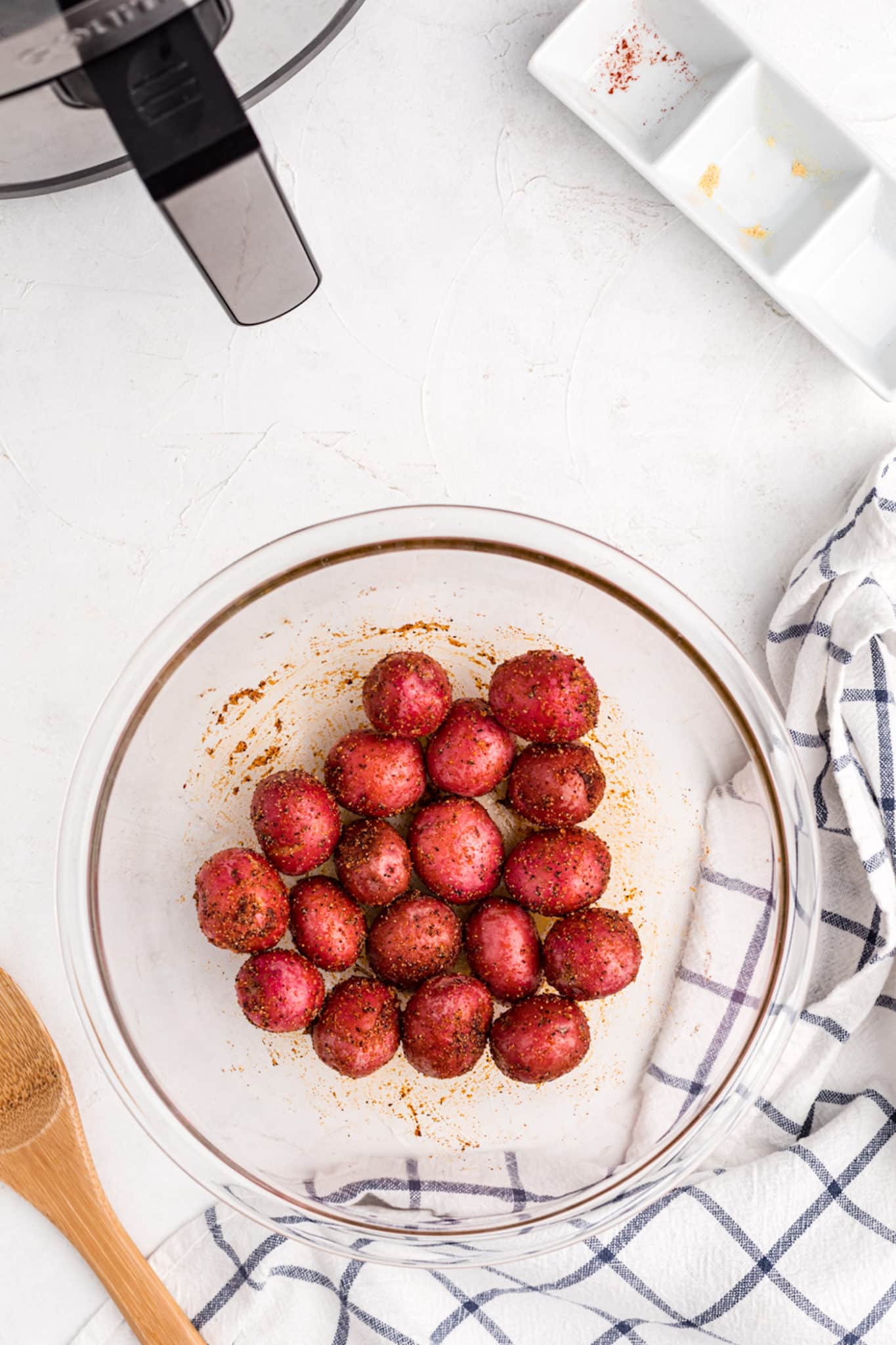 a bowl of seasoned red potatoes.