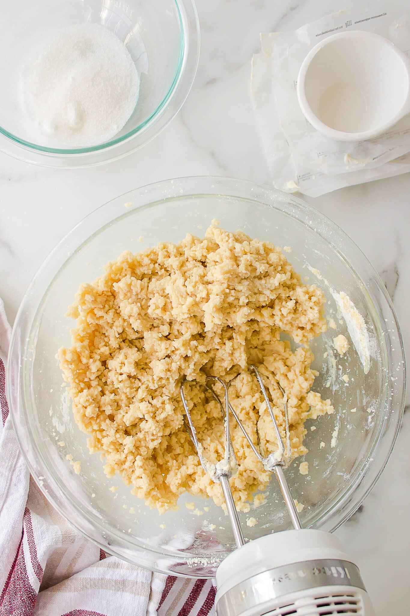 mixing together ingredients for sugar cookies.