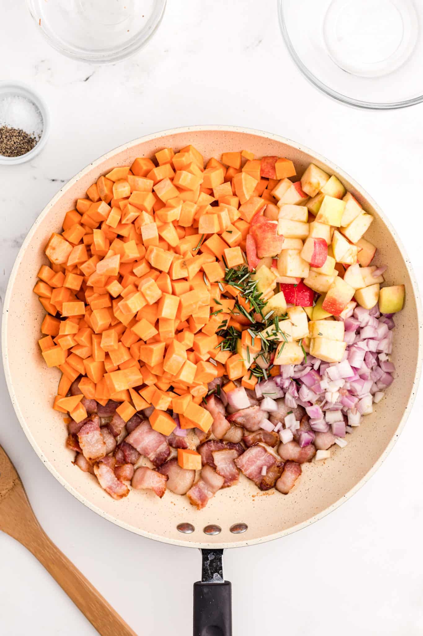 making sweet potato hash in a skillet