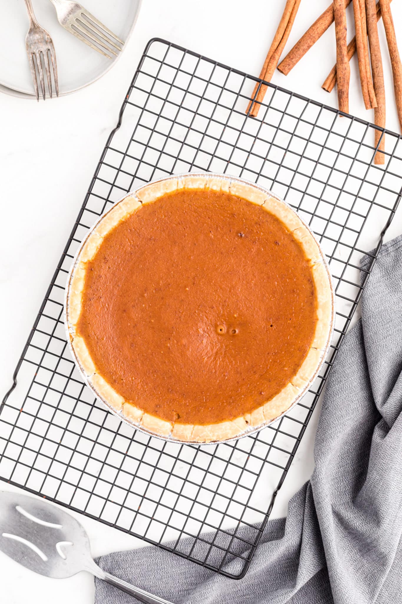 gluten-free and dairy-free pumpkin pie on cooling rack.