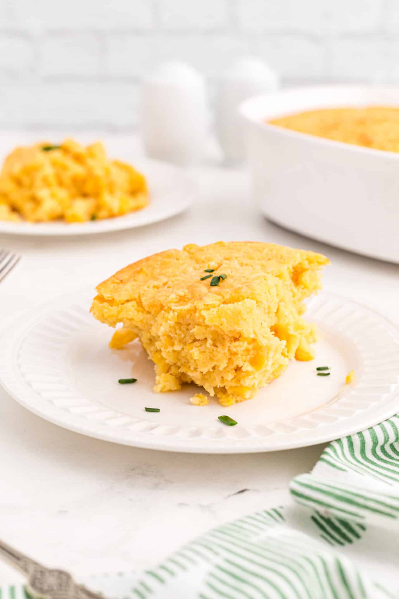 serving of dairy free gluten-free corn casserole on plate.