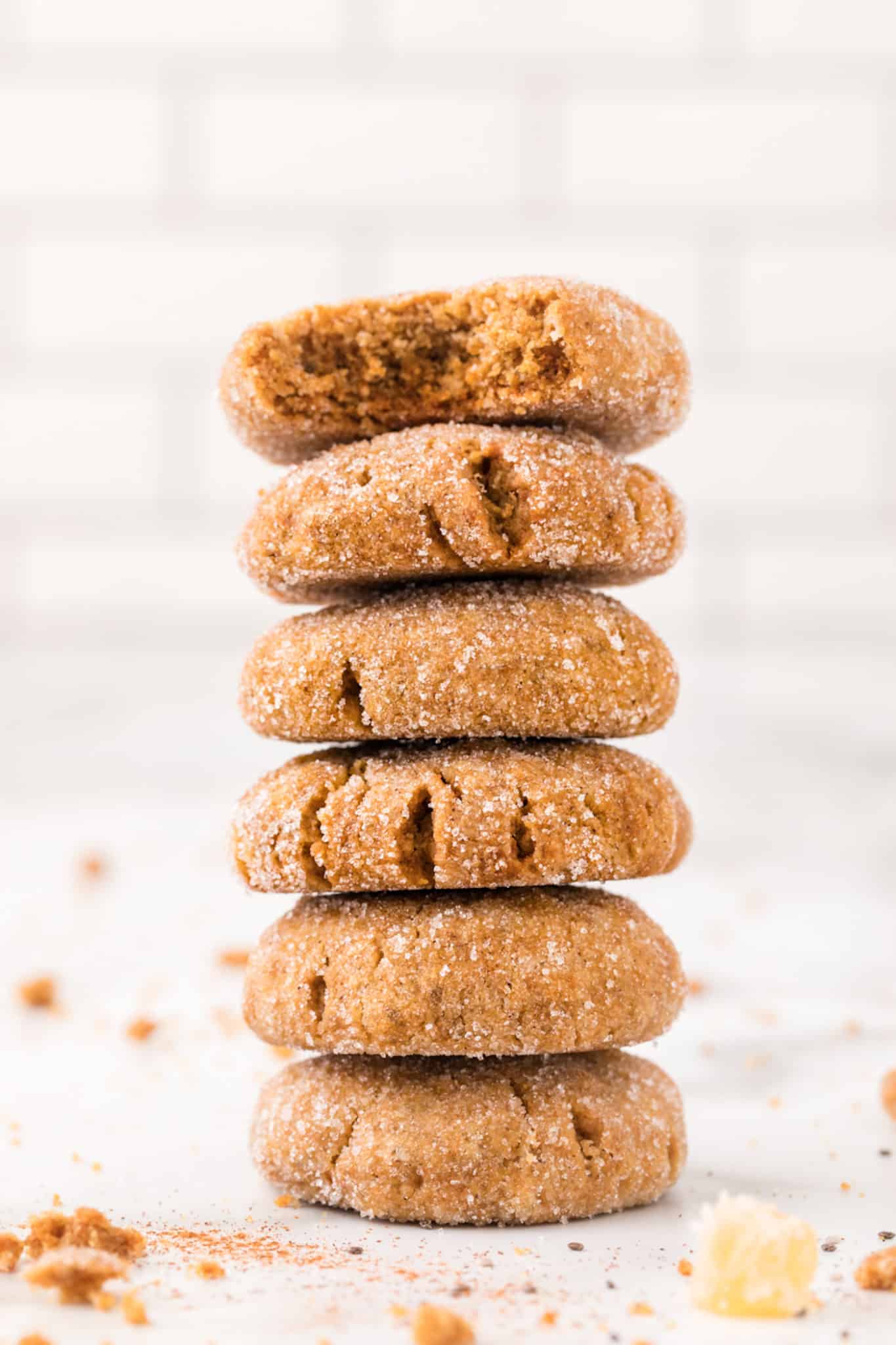 a stack of vegan gingersnap cookies.