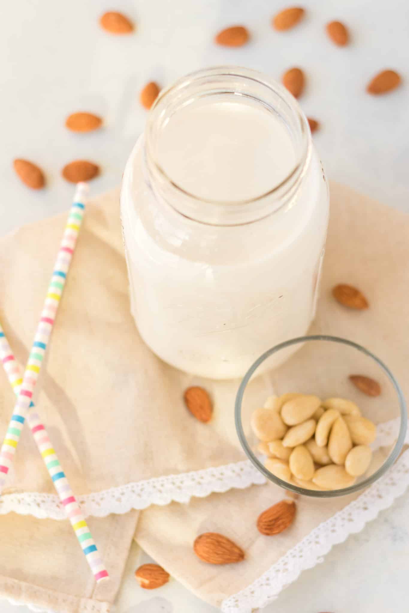 jar of almond milk on table