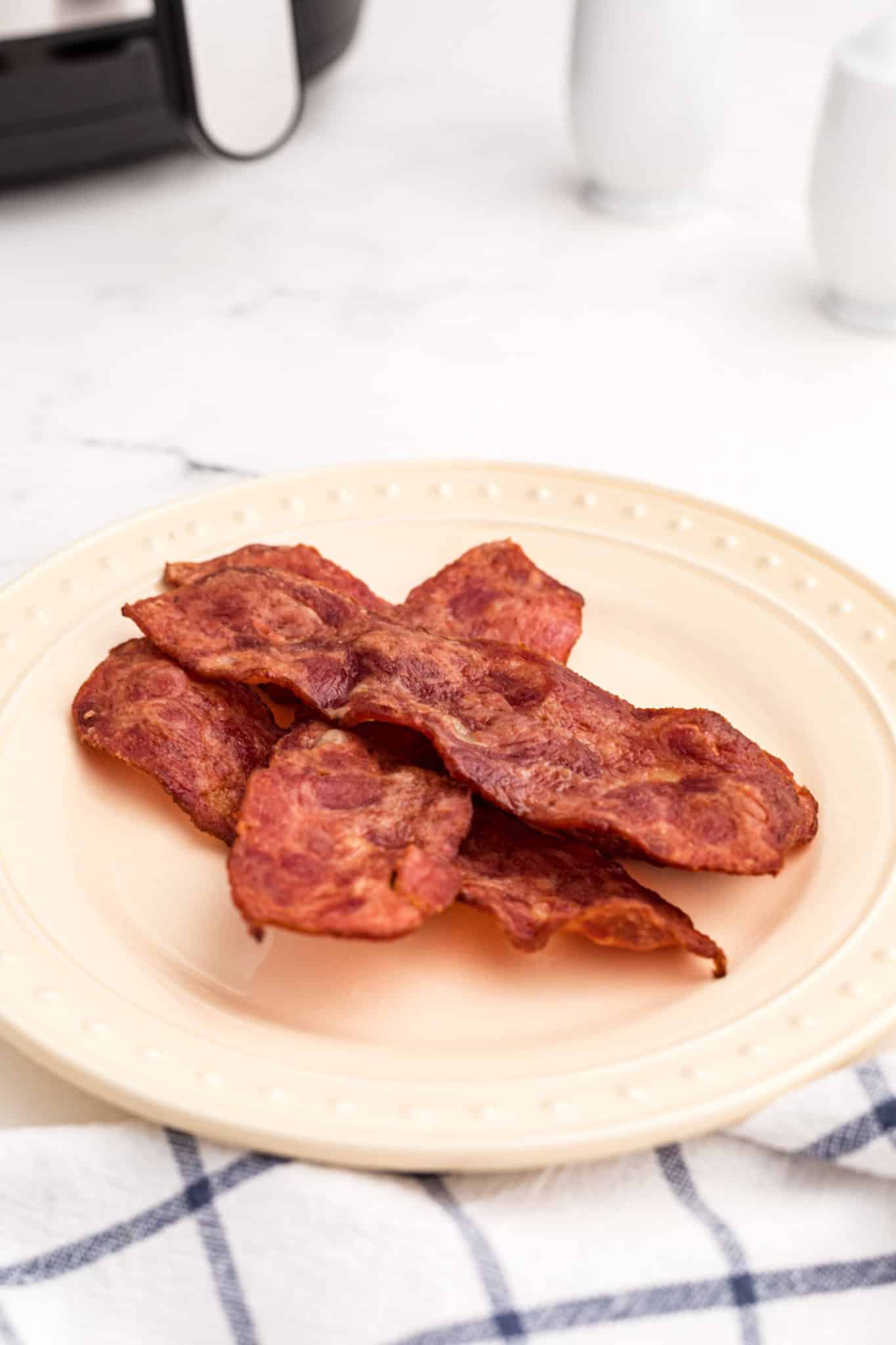cooked turkey bacon on a plate