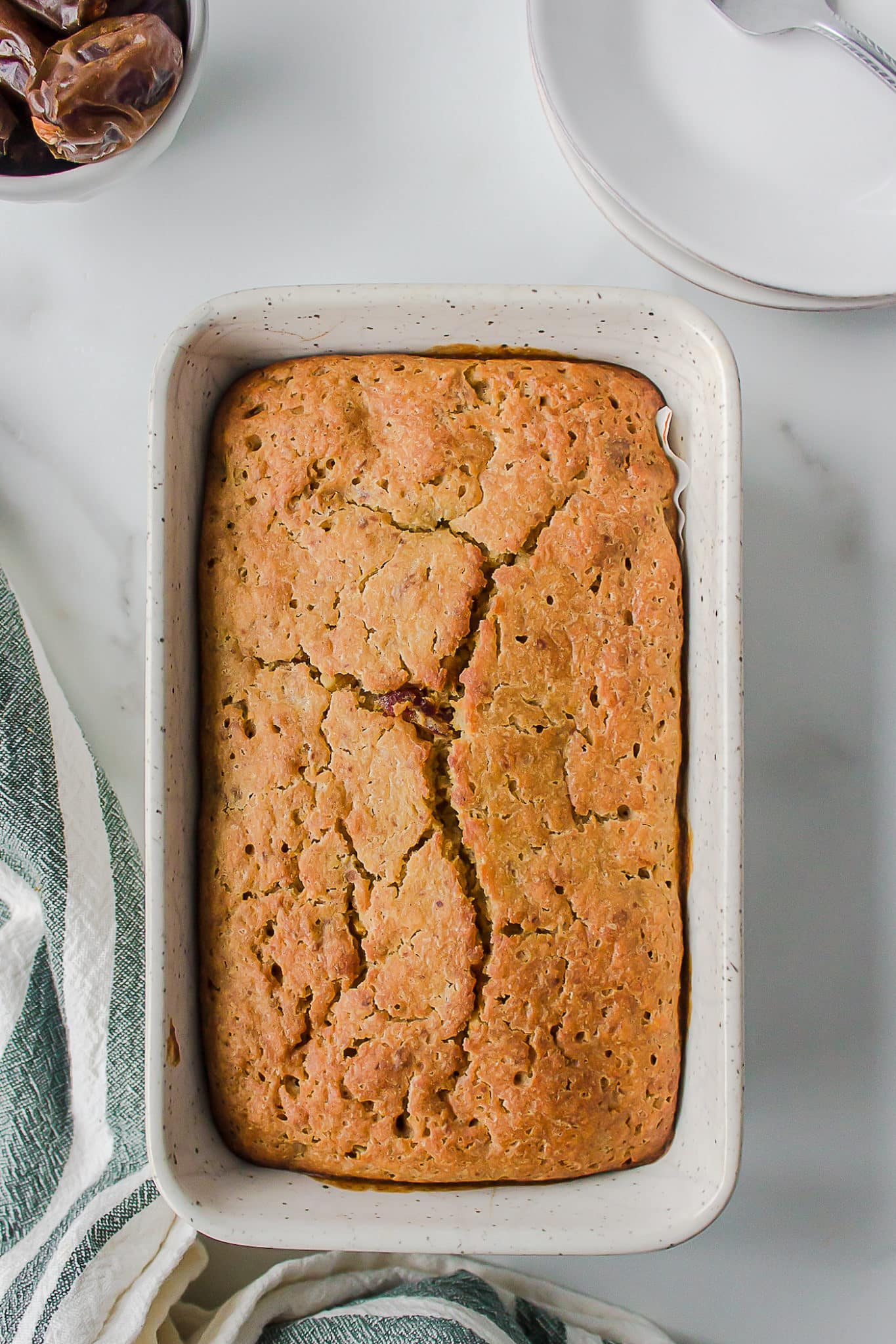 a loaf of gluten-free date nut bread.