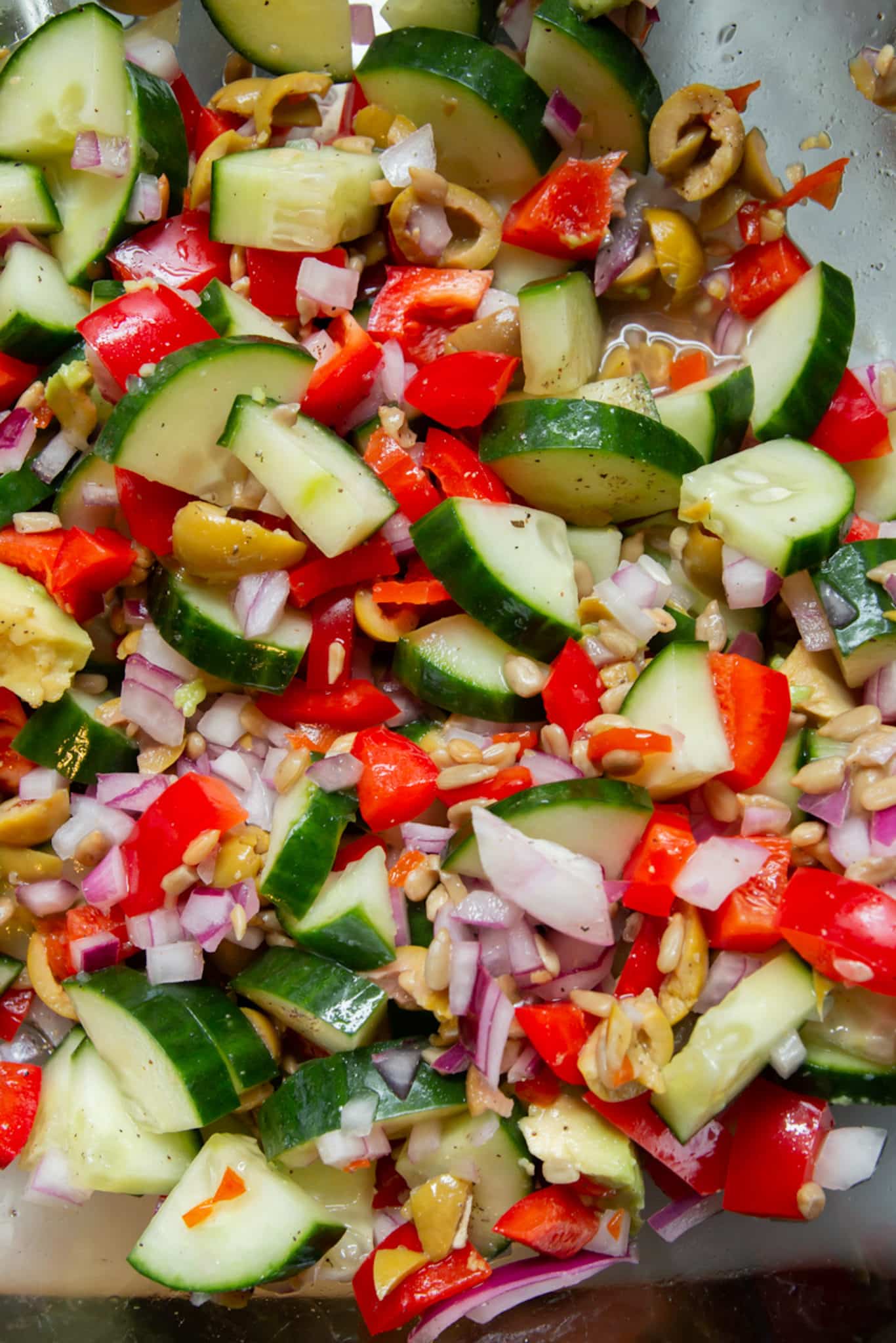 chopped cucumbers, olives and onion as part of lentil salad.