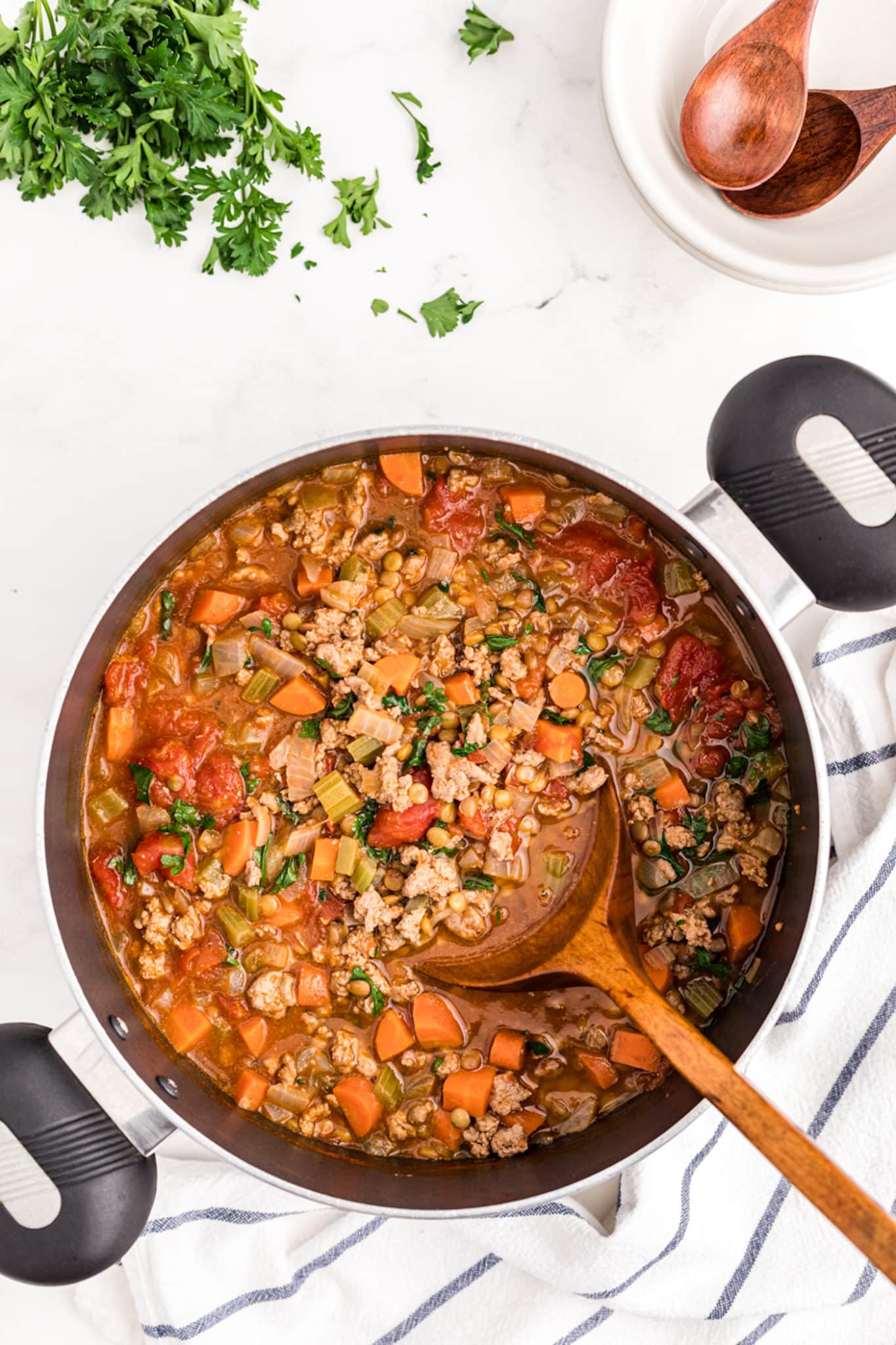 cooked lentil turkey soup in pot