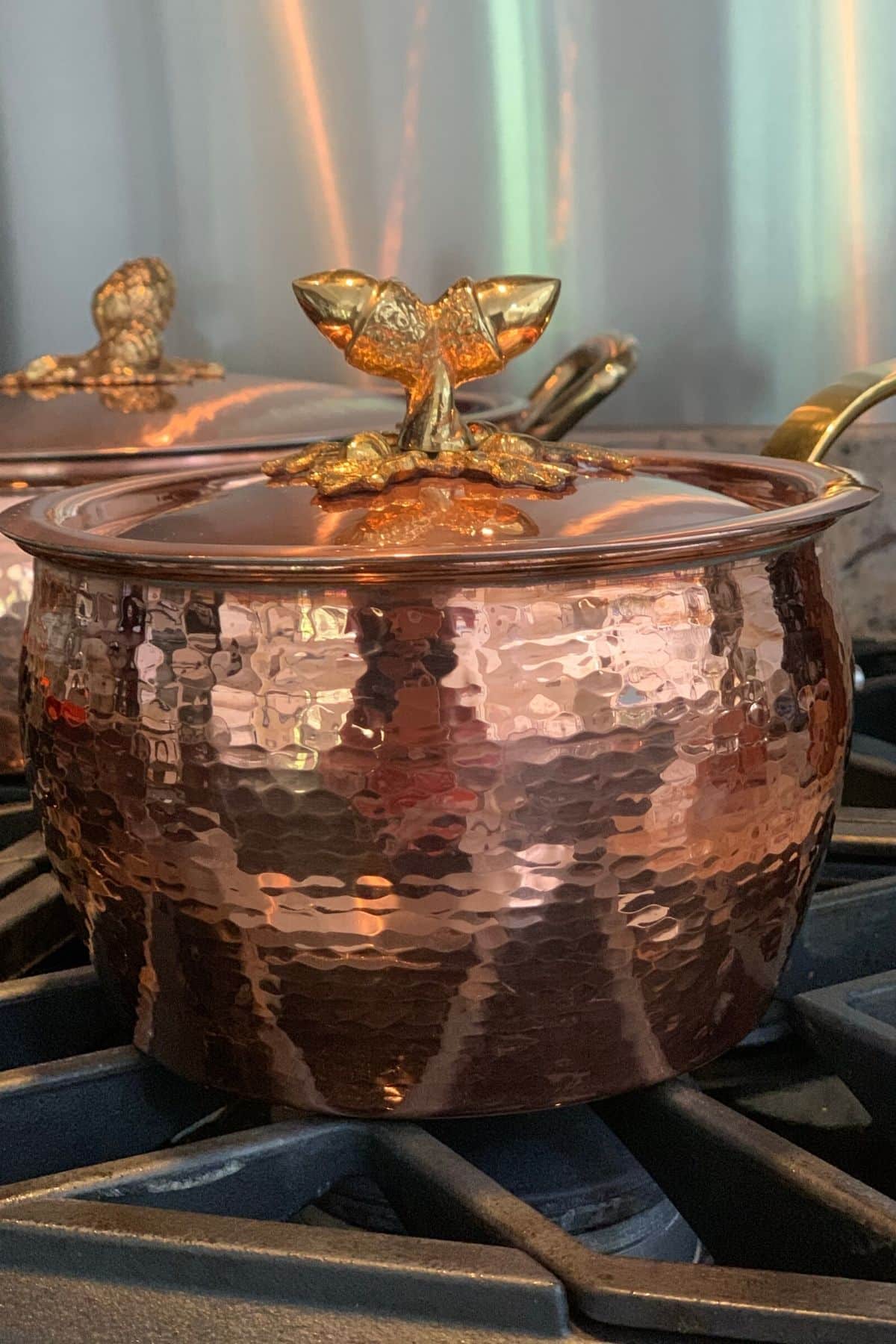 copper cookware on stovetop.