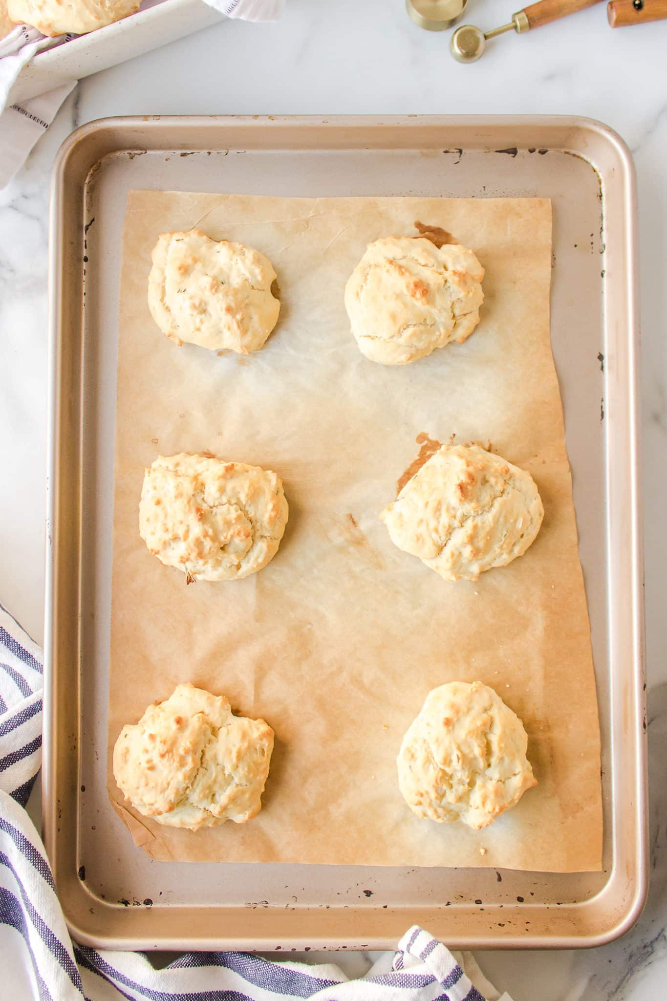 a sheet pan with drop biscuits