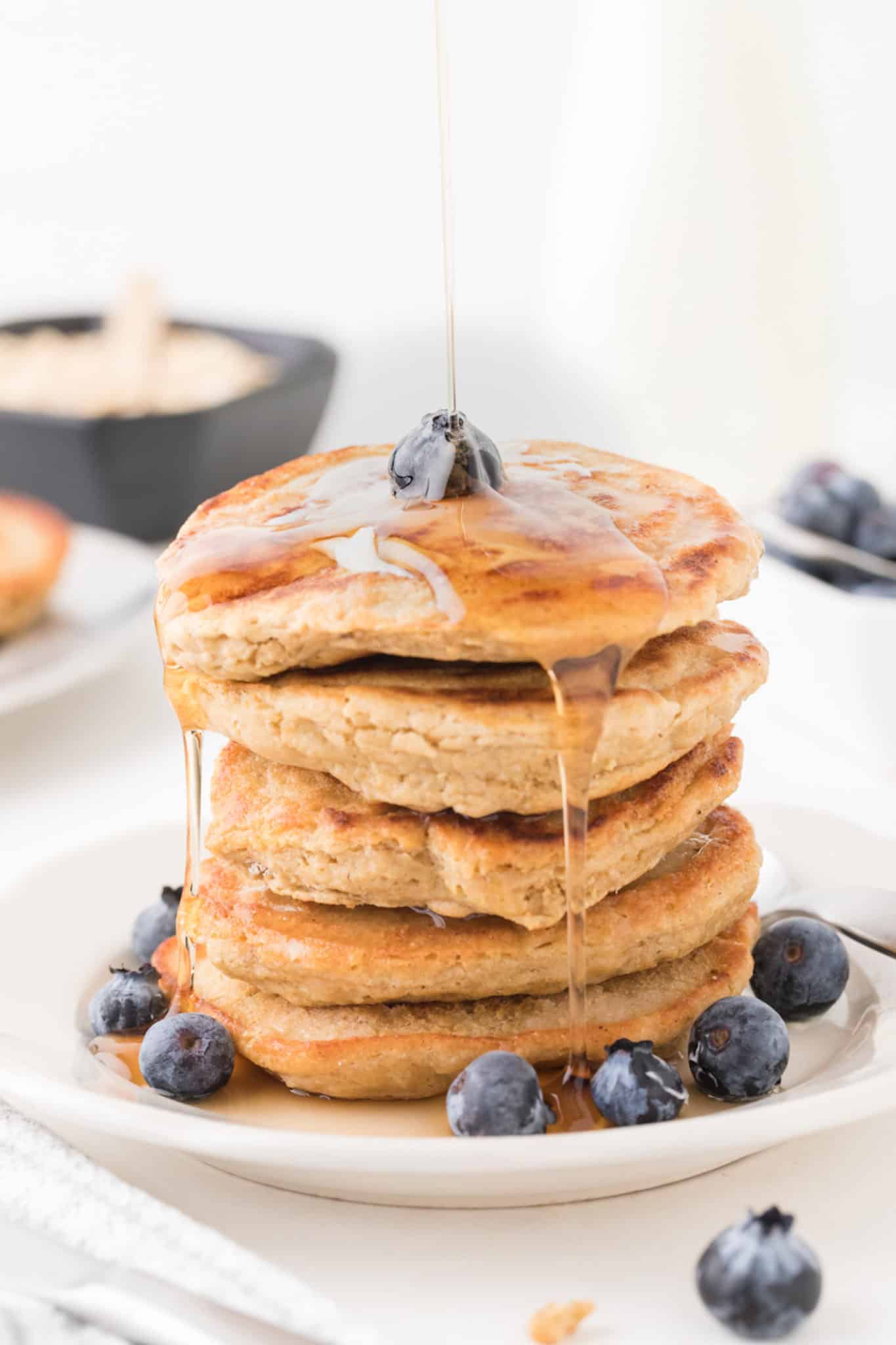 a stack of oat flour pancakes
