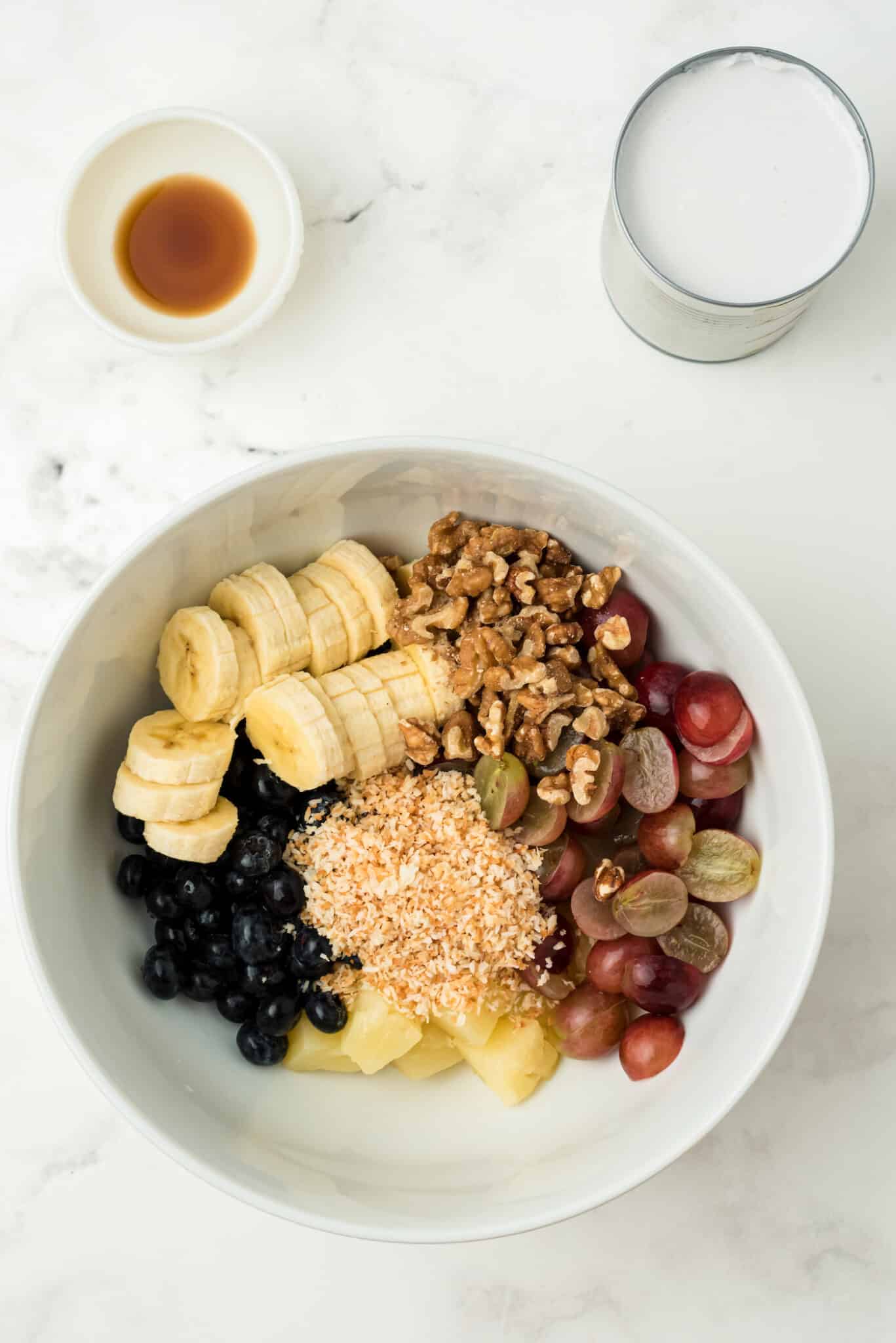 ingredients in bowl for ambrosia salad.