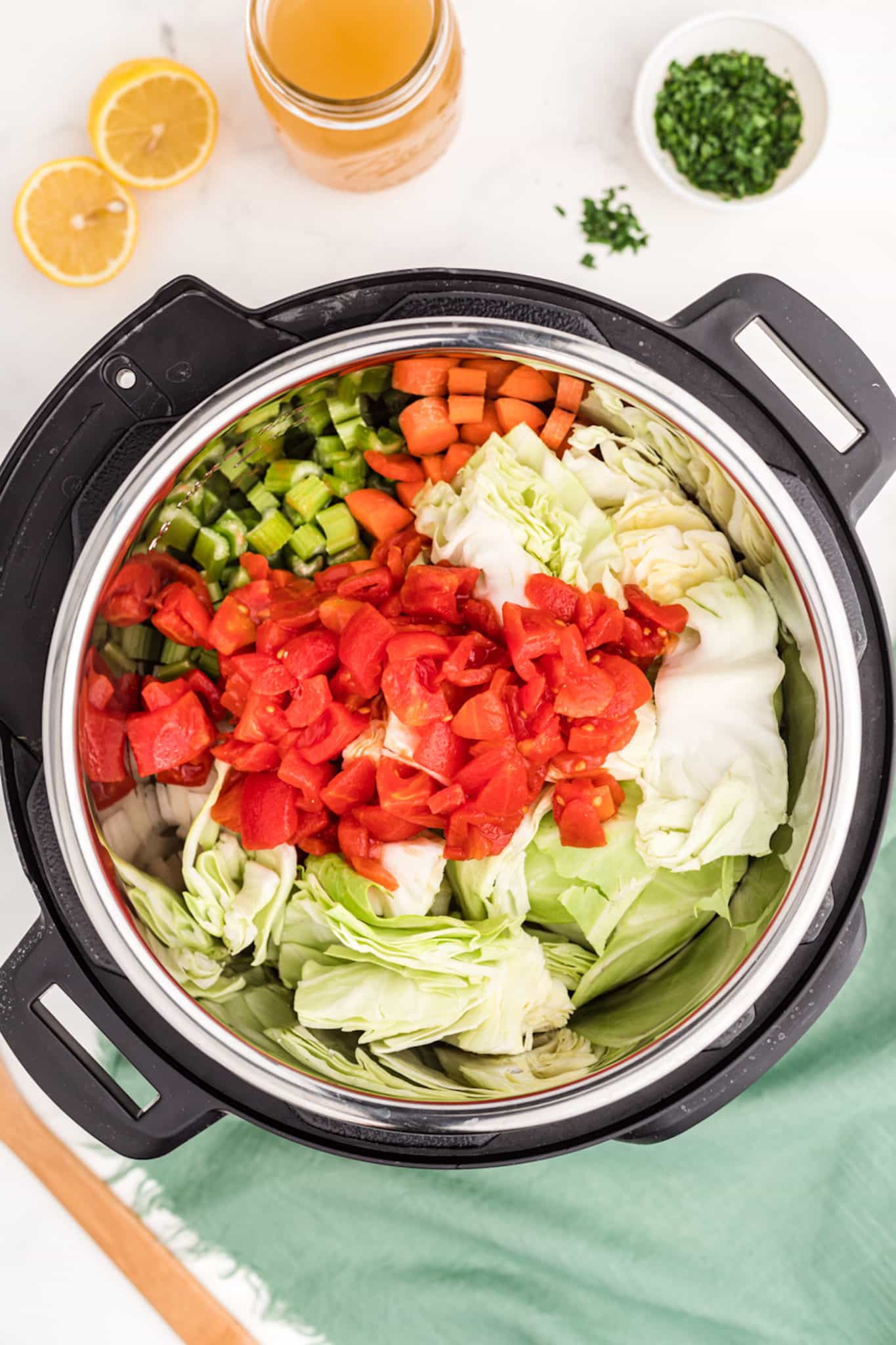 an instant pot full of vegetables to make cabbage detox soup.