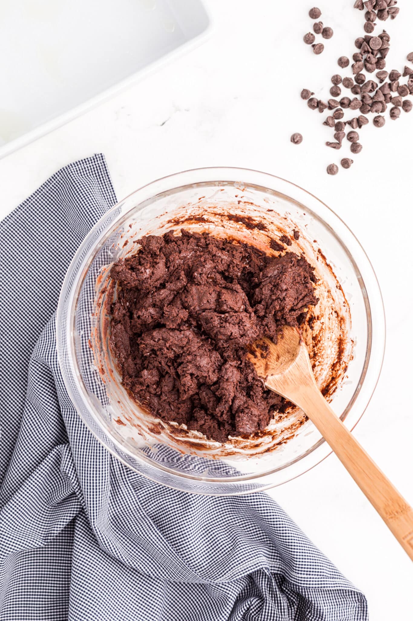 stirring up dairy-free fudge ingredients.
