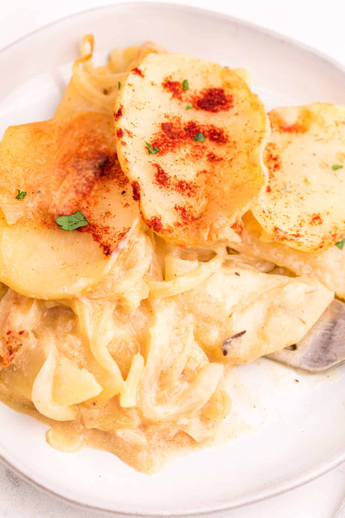 serving of creamy dairy-free and gluten-free scalloped potatoes.