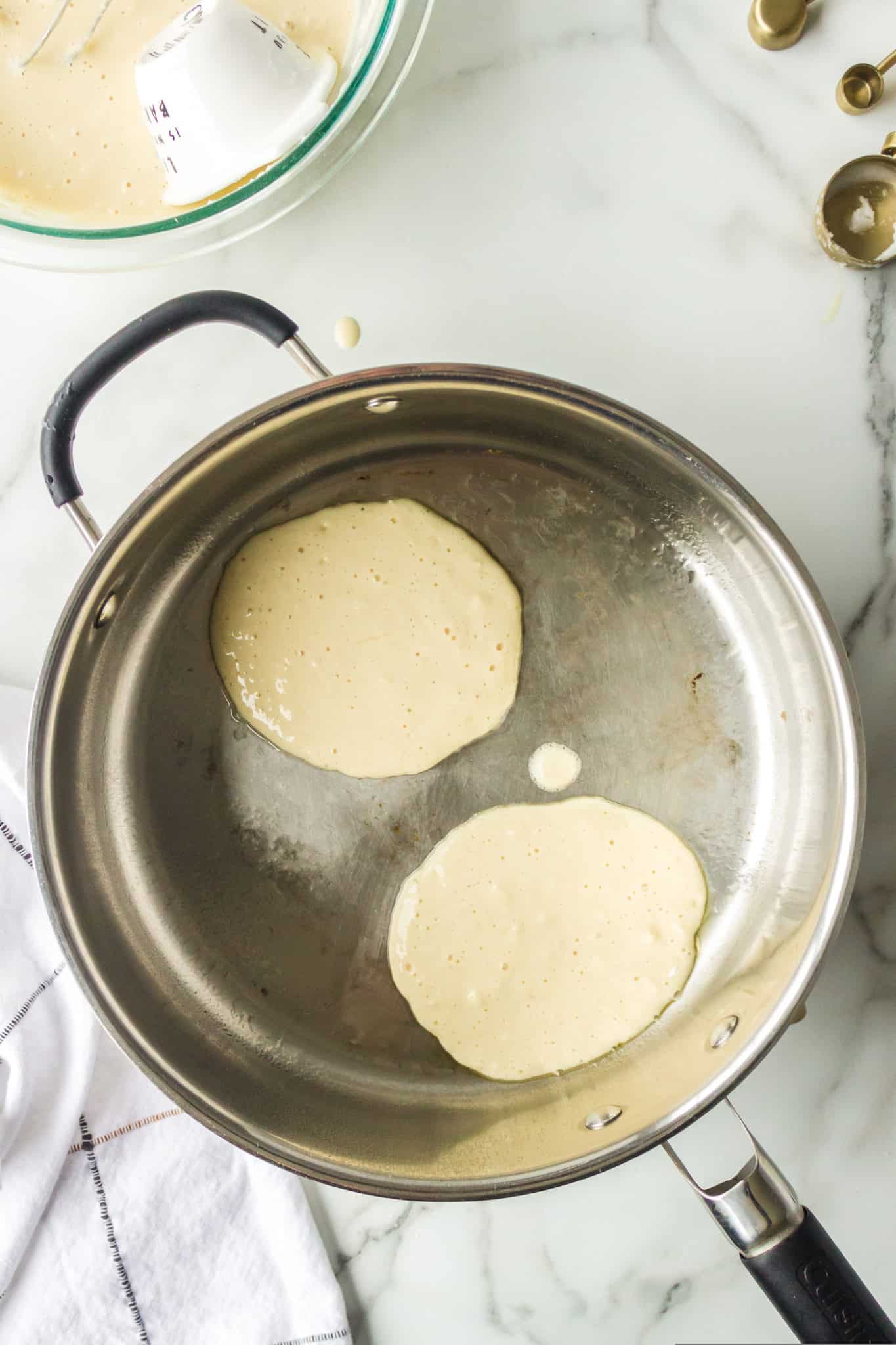 pancake batter in skillet.