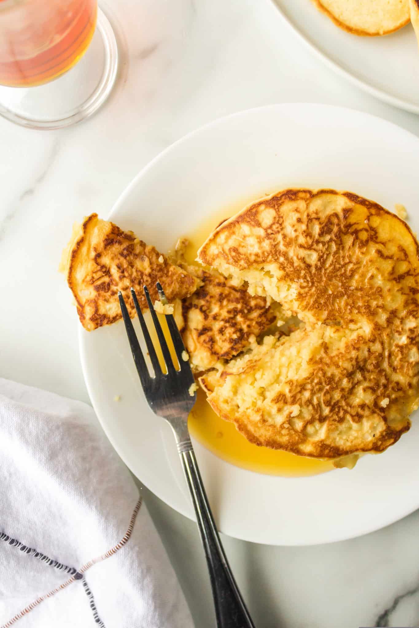 rice flour pancakes on a plate with a fork.