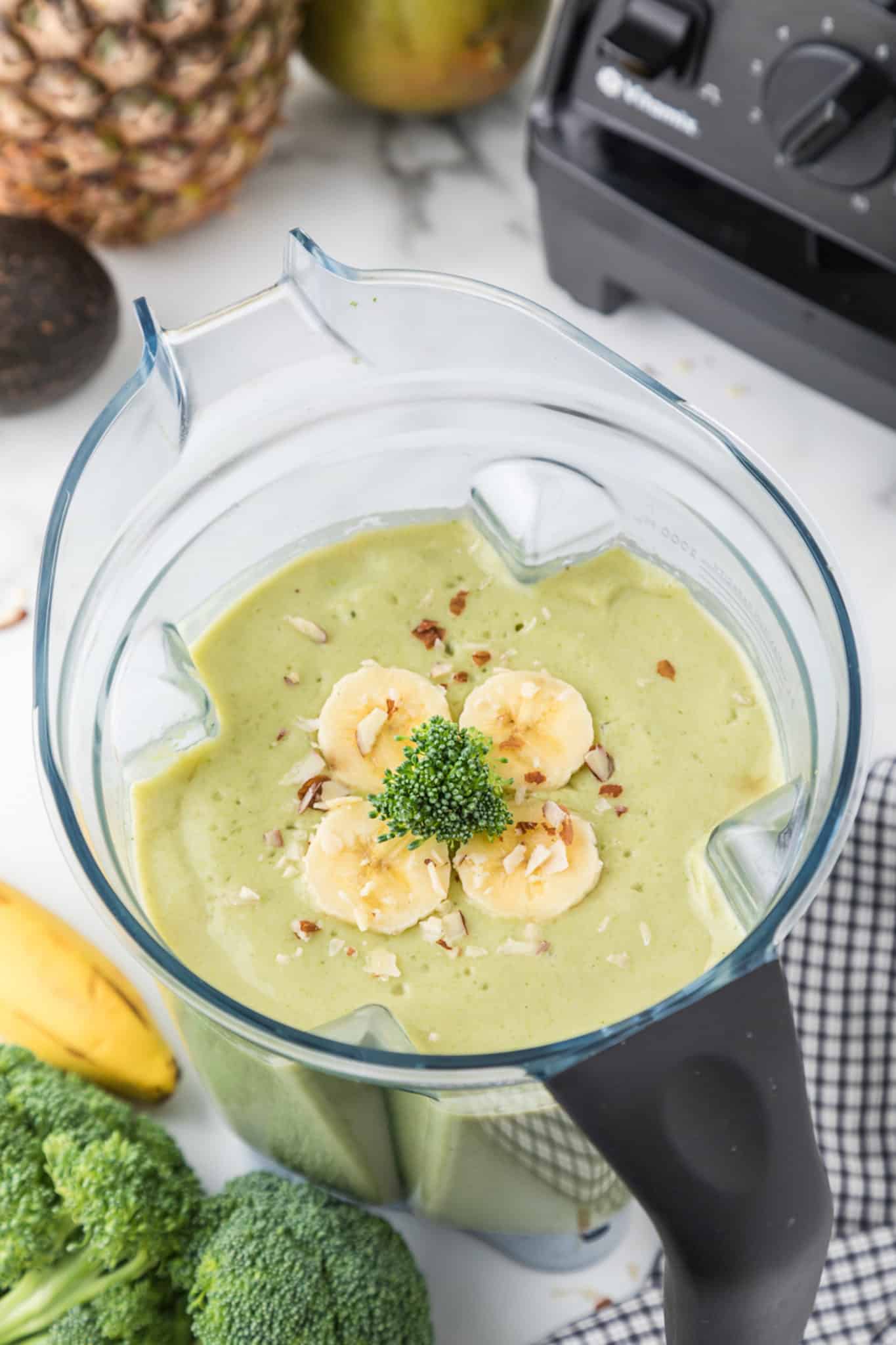broccoli pineapple smoothie in blender.