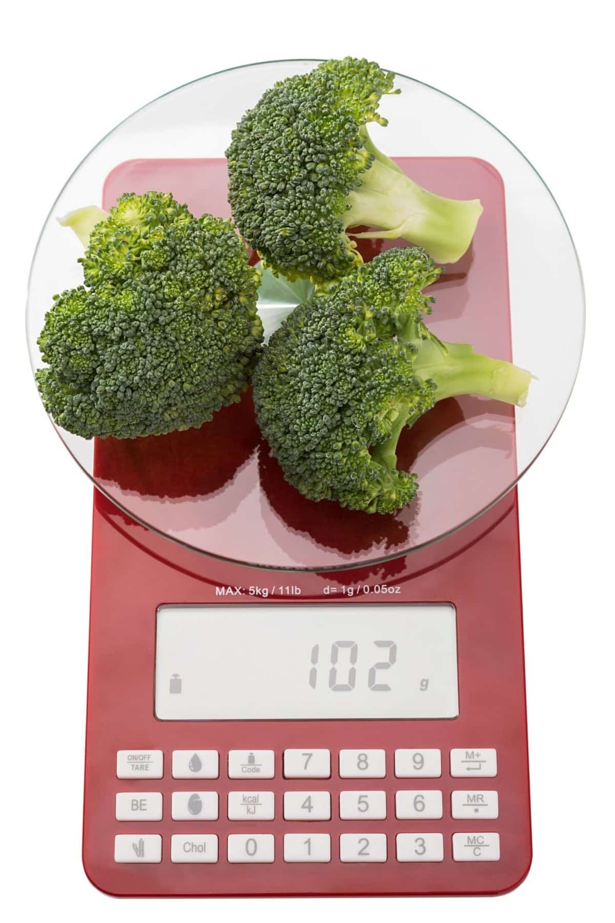 broccoli on a food scale.
