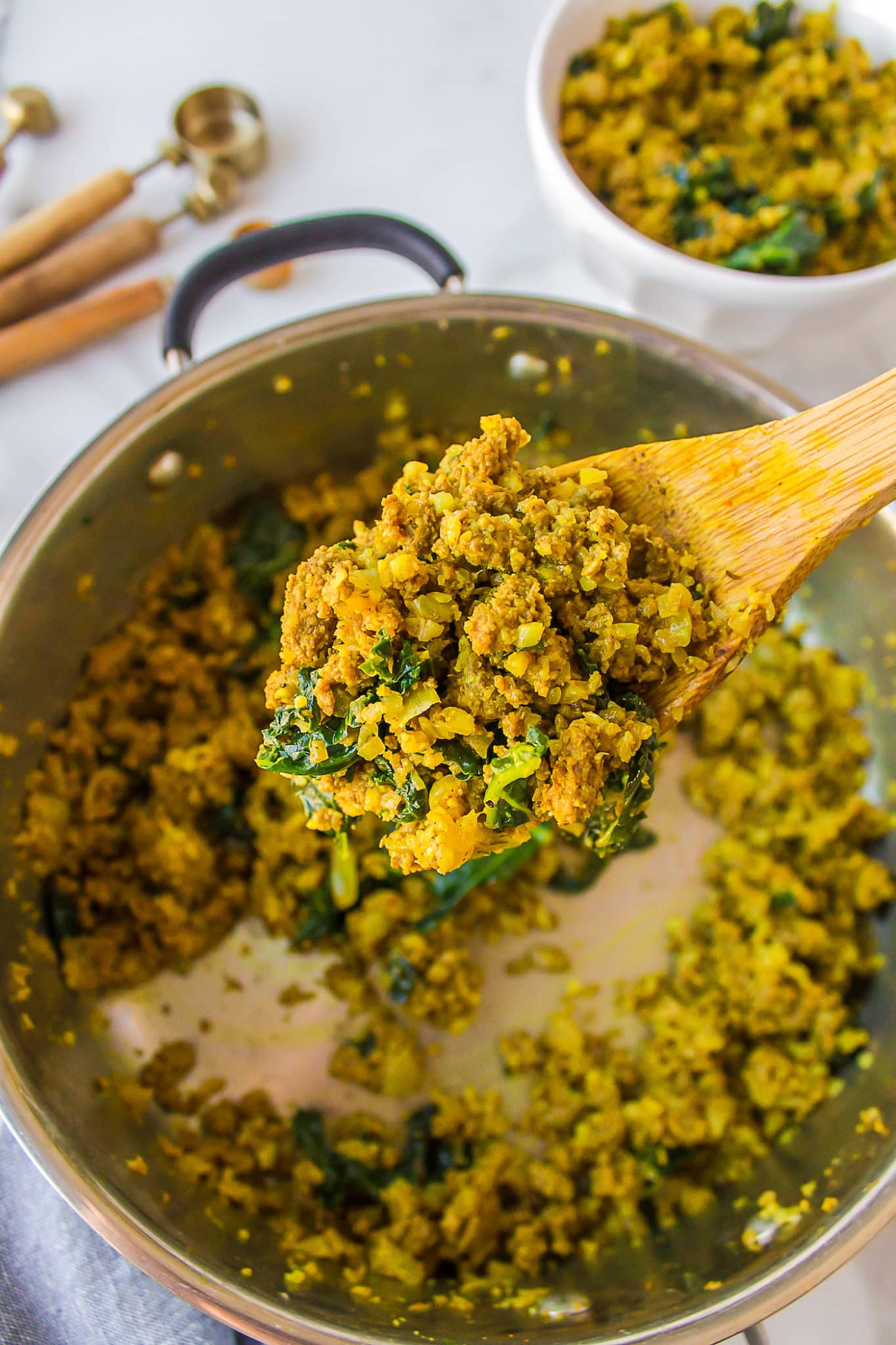 a spoonful of ground bison and turmeric cauliflower rice.