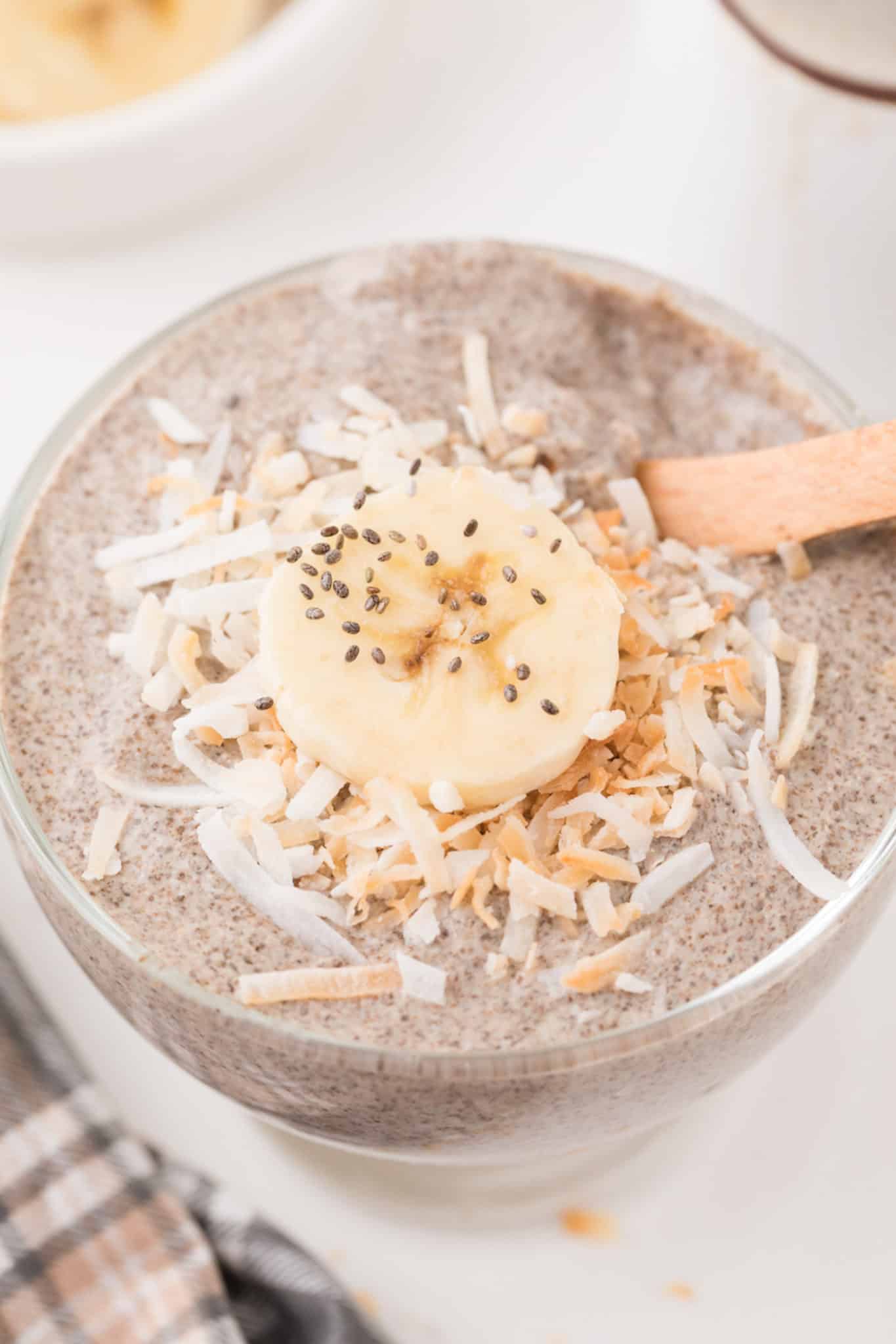 chia pudding with banana and coconut on top