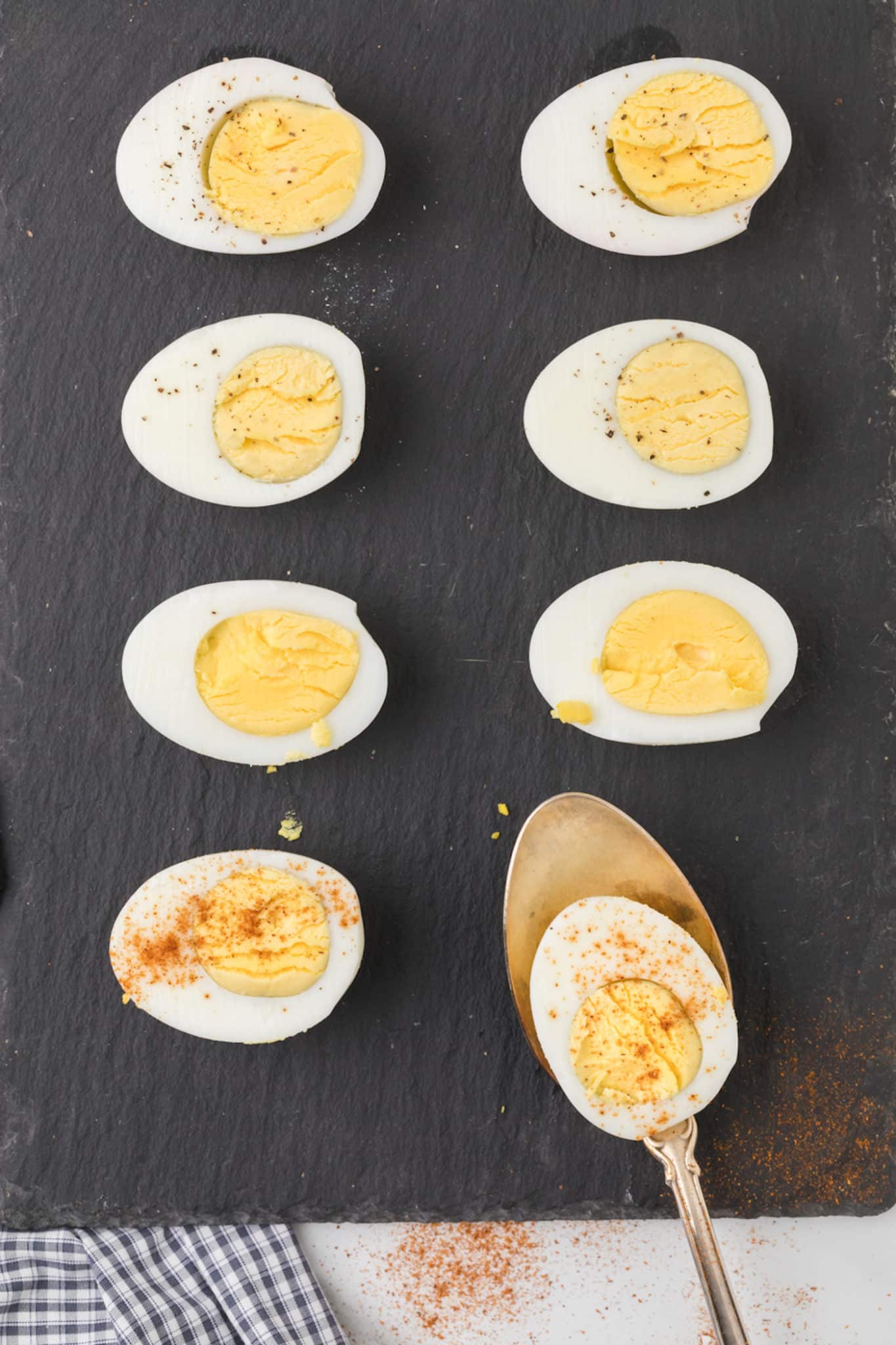 plate of instant pot hard boiled eggs cut in half.