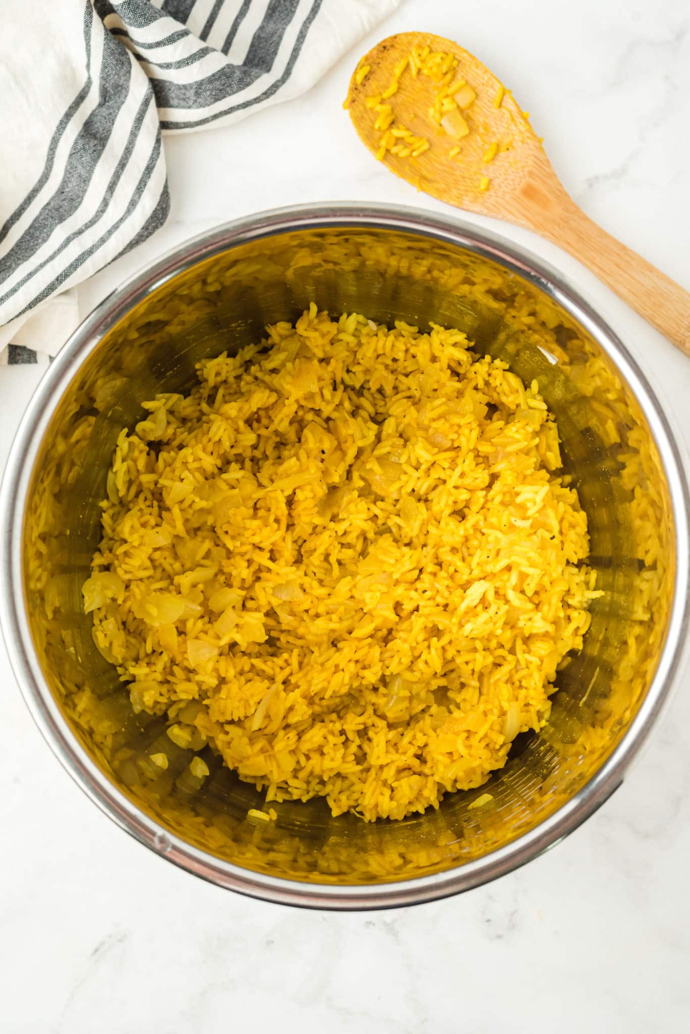 cooked yellow rice inside instant pot.