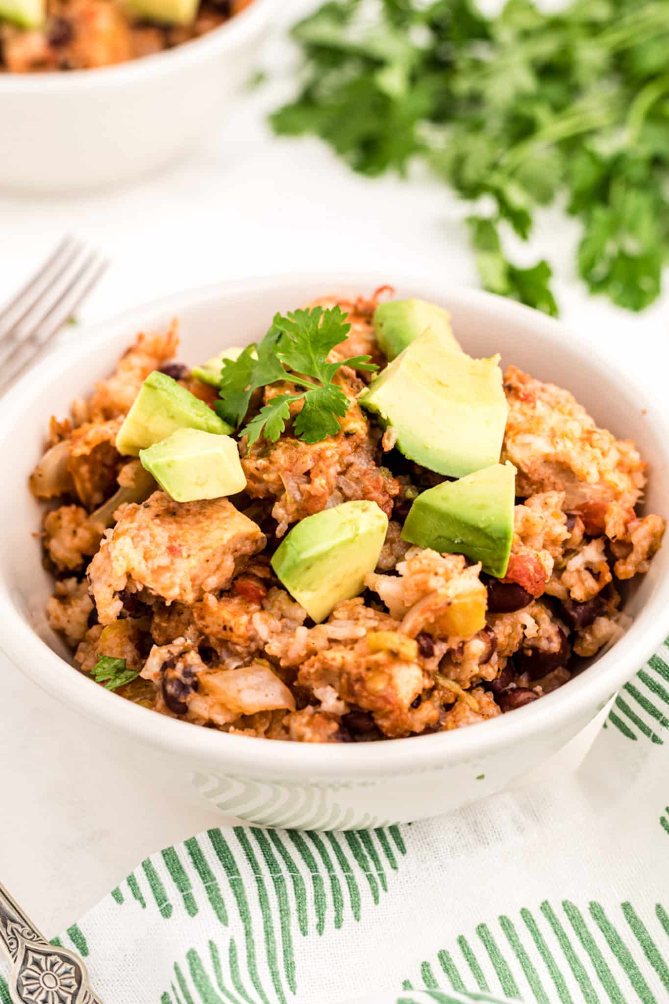 a bowl of crockpot mexican rice, chicken, and beans.