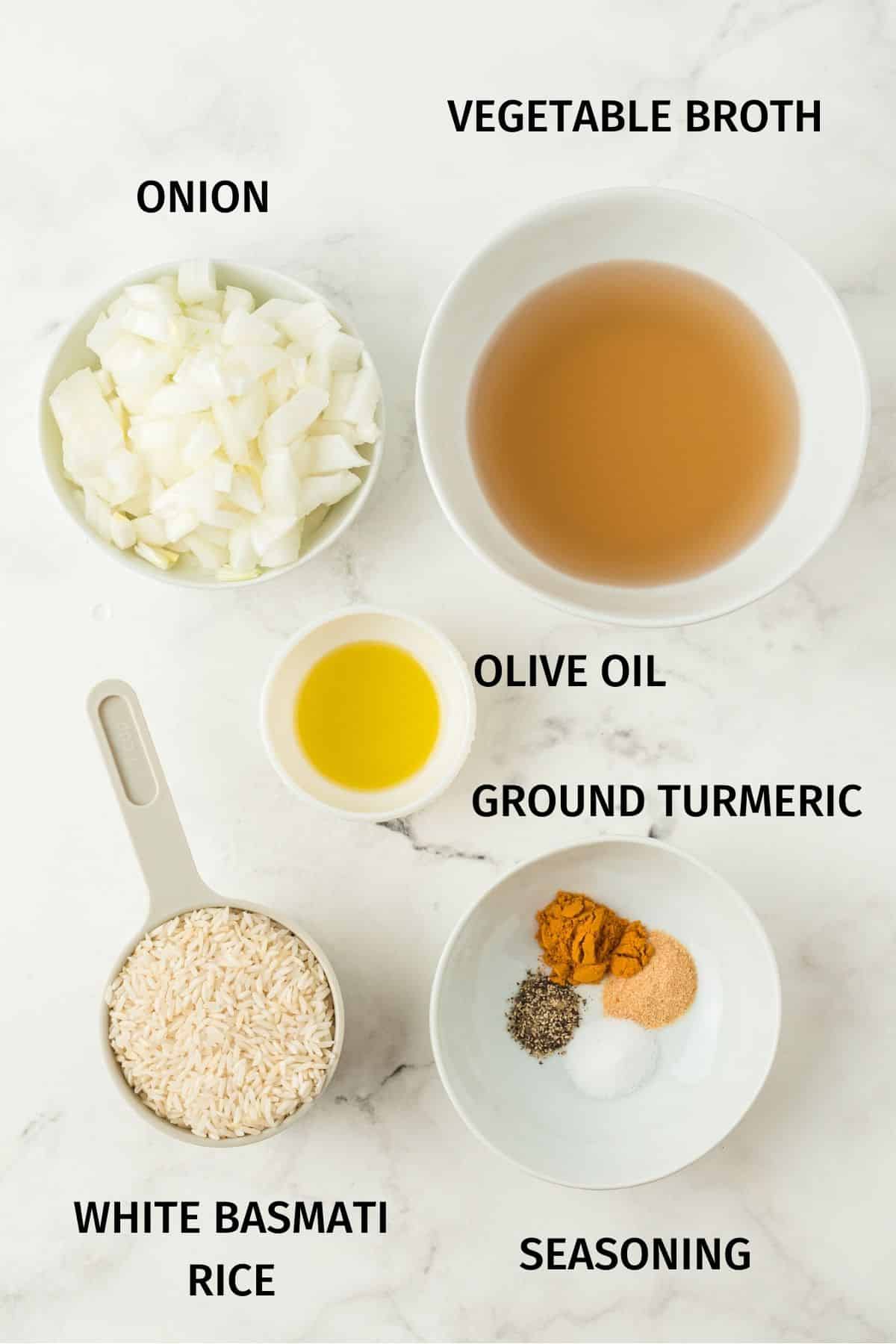 ingredients for yellow rice on a countertop with labels.