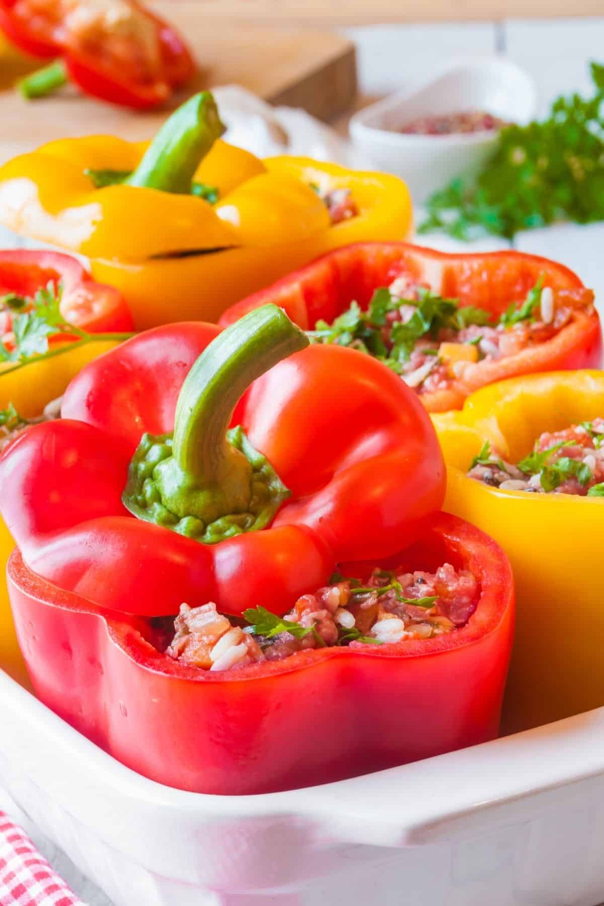 stuffed peppers in casserole dish.