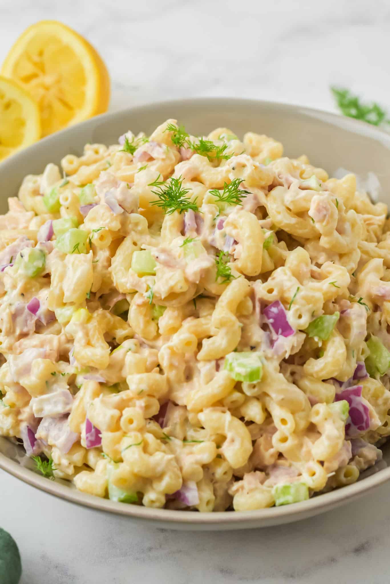 a bowl of pasta salad with tuna