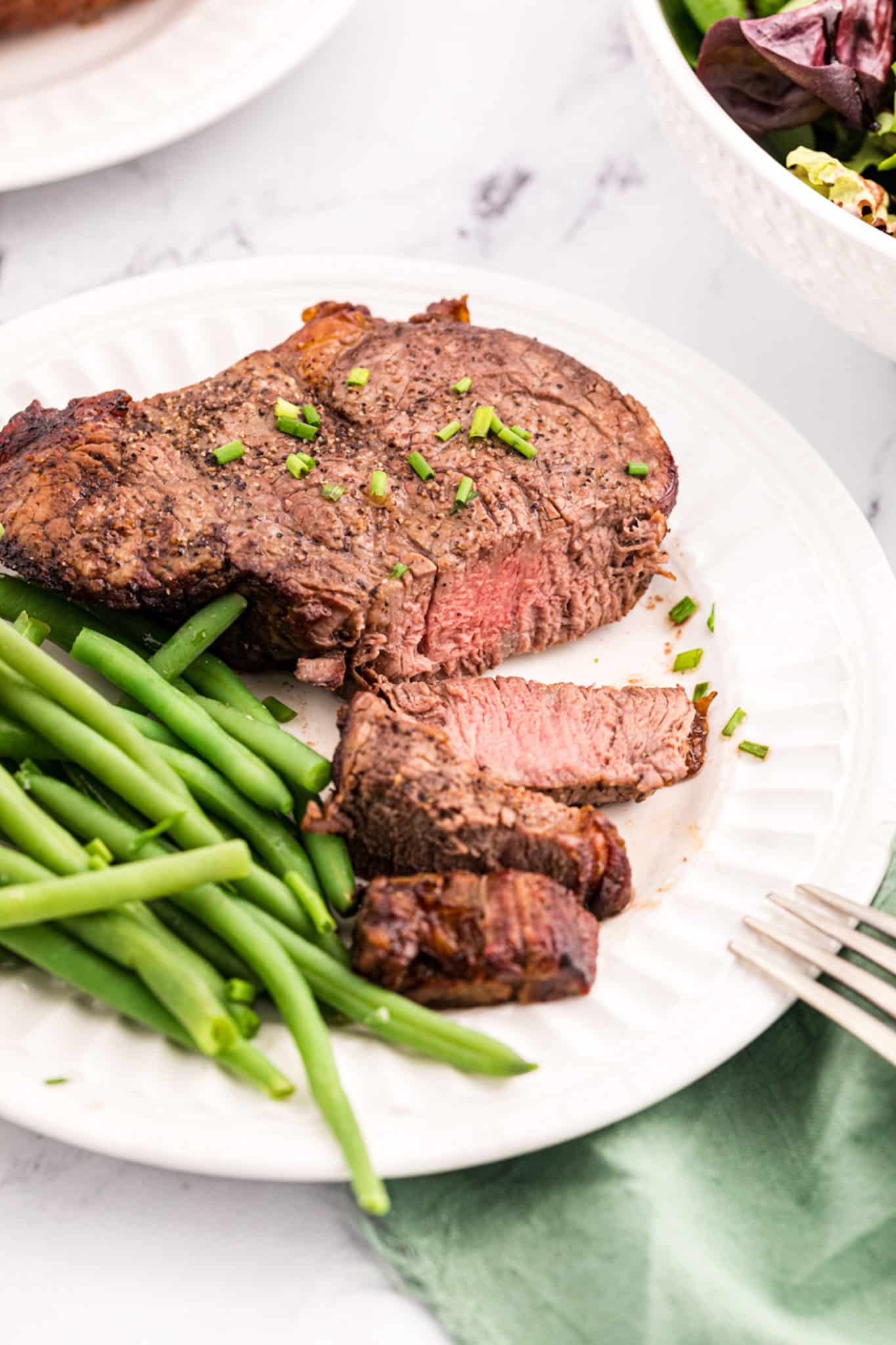 filet mignon with green beans.