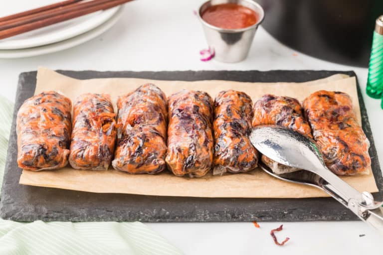 a sheet pan of spring rolls.