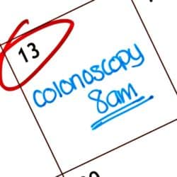 close up of calander with colonoscopy written on it