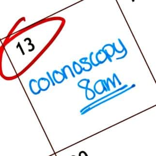 close up of calander with colonoscopy written on it