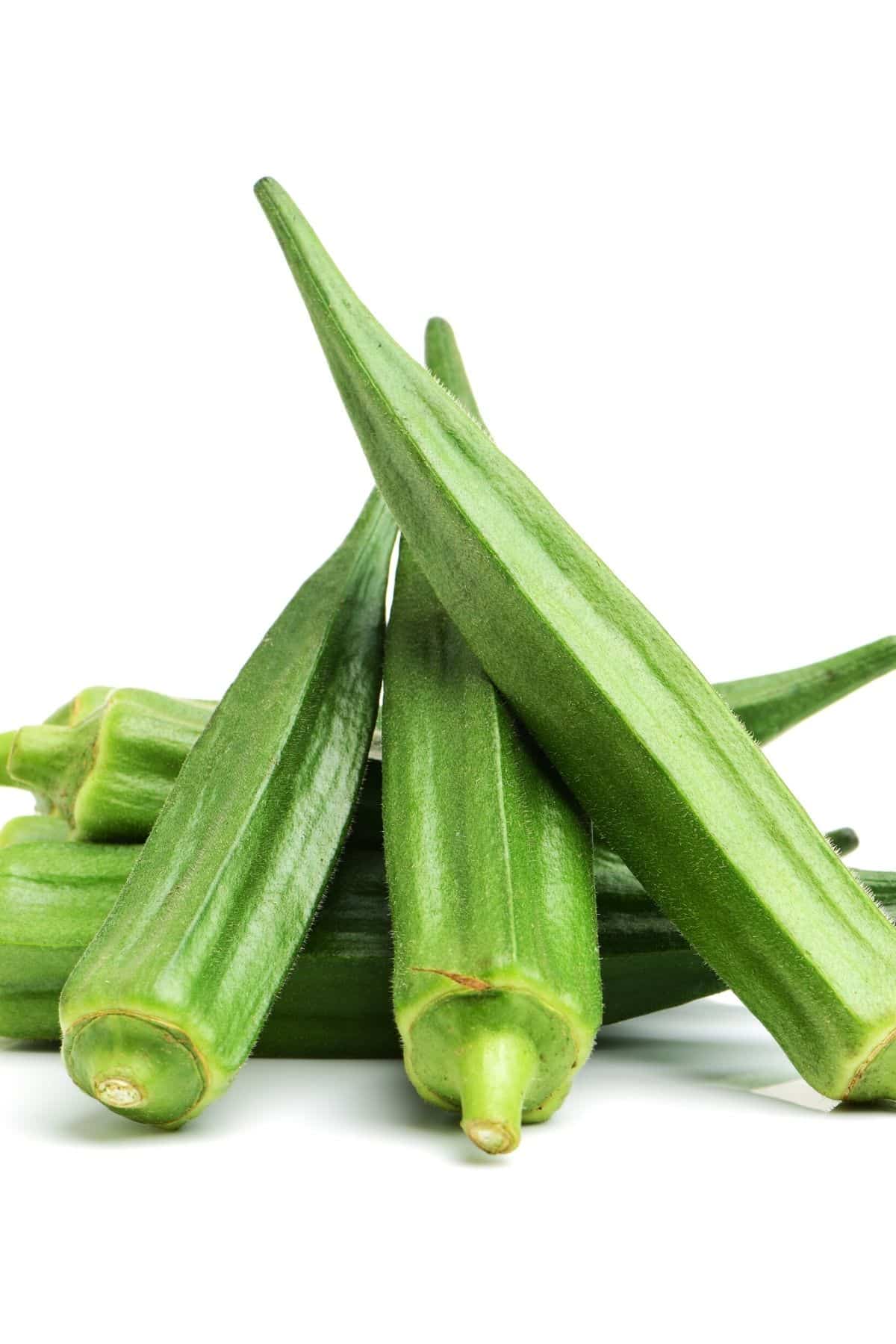 fresh okra on a white background.