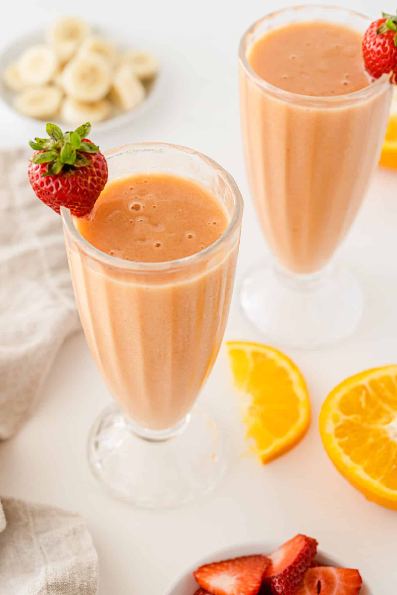 a glass of strawberry smoothie
