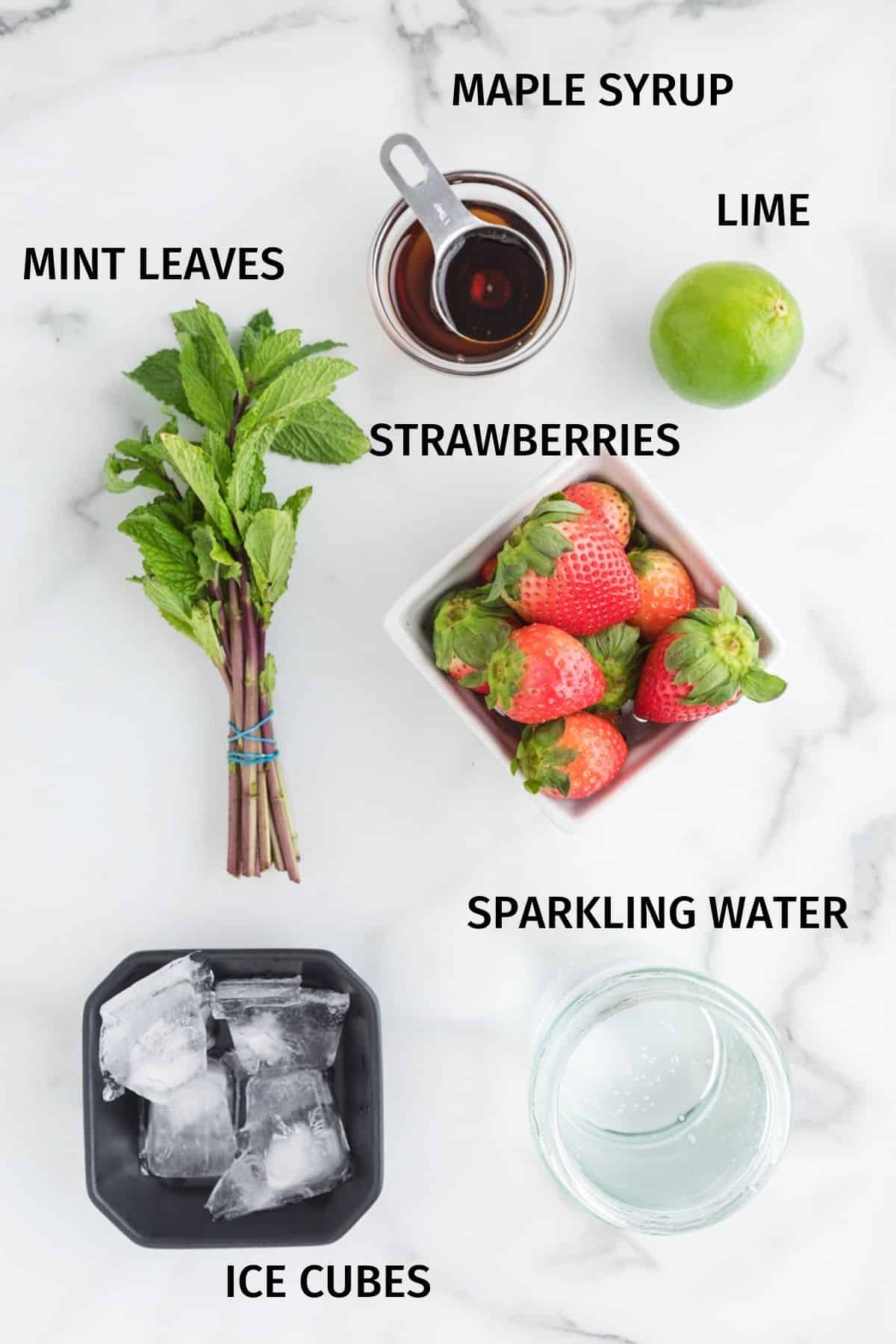 photo with ingredients to make strawberry mocktail.