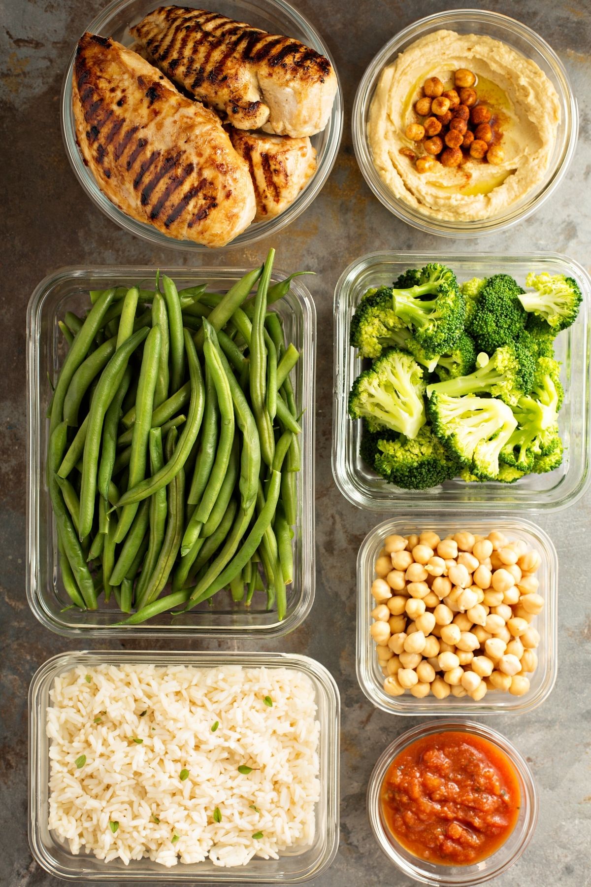 buffet style meal prep with veggies and chicken.