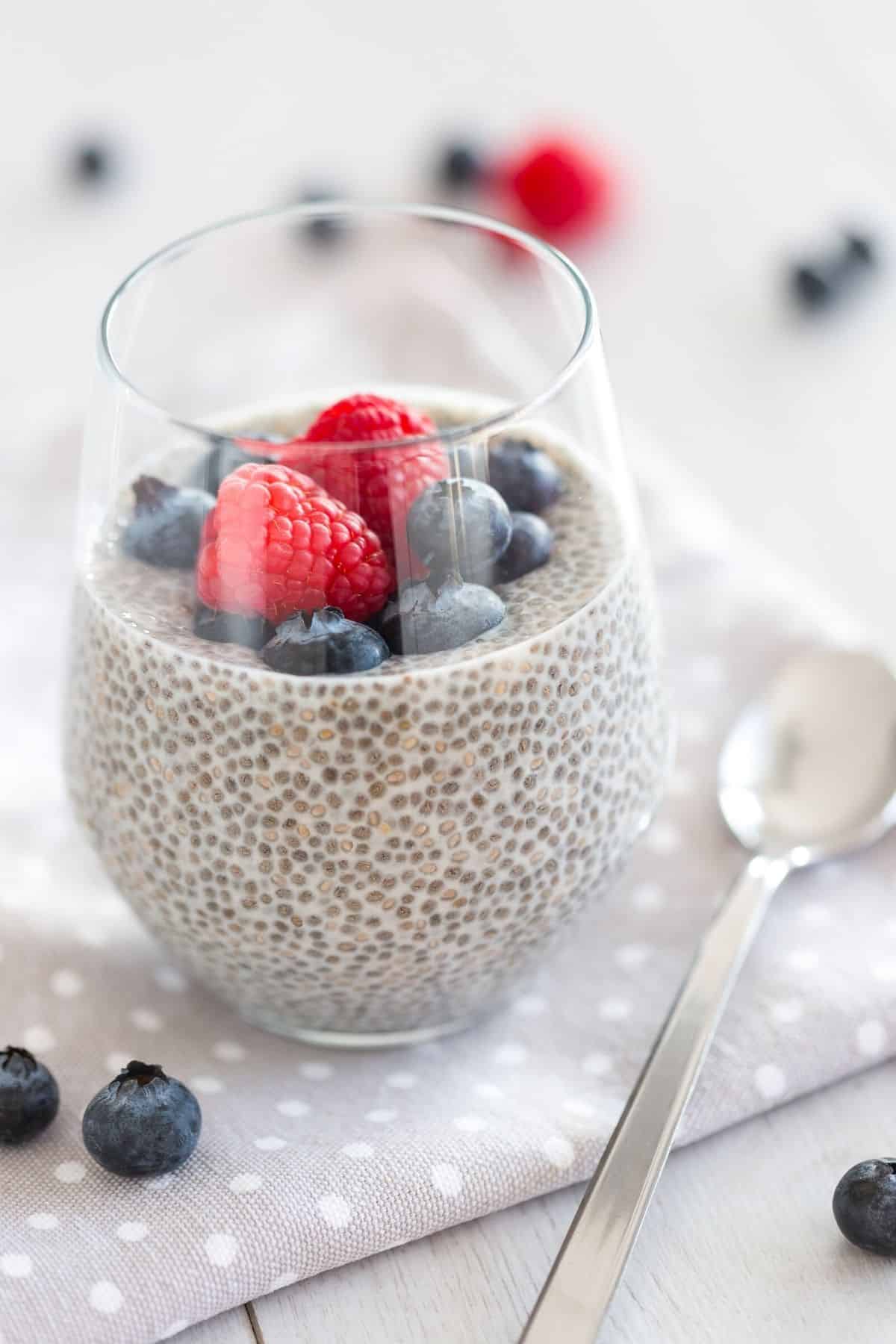chia pudding with berries on top.