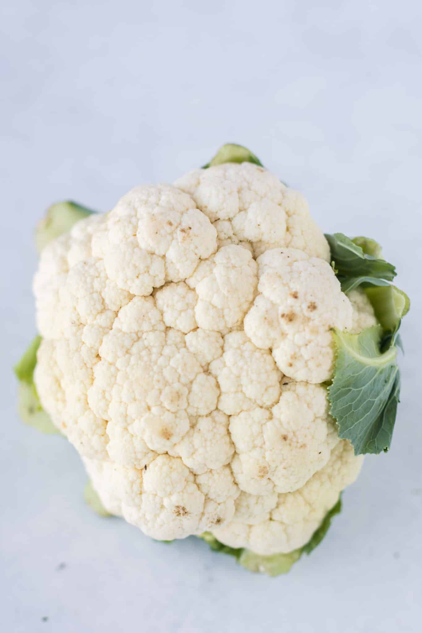 head of cauliflower on a tabletop