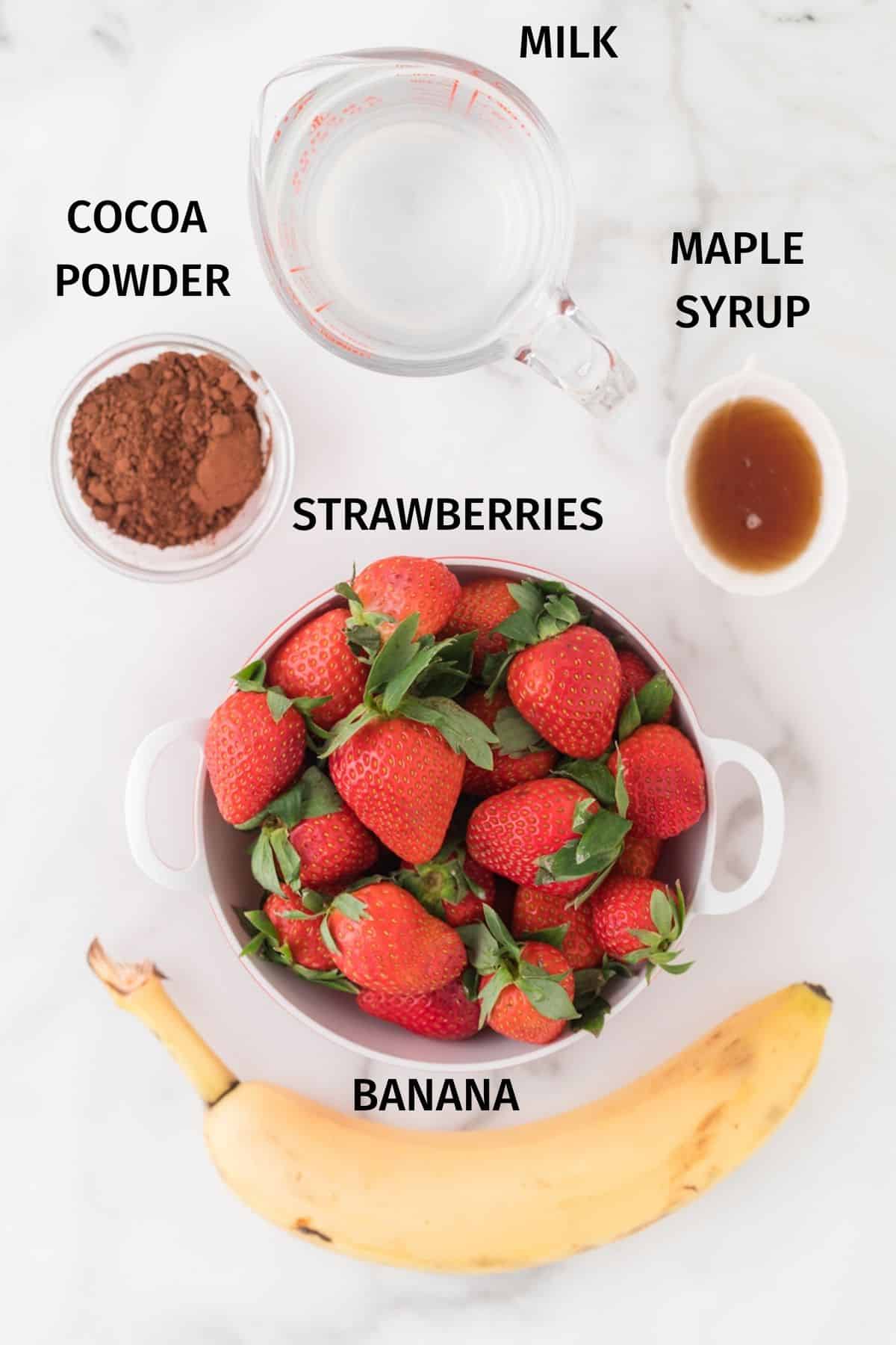 ingredients for chocolate strawberry banana smoothie.