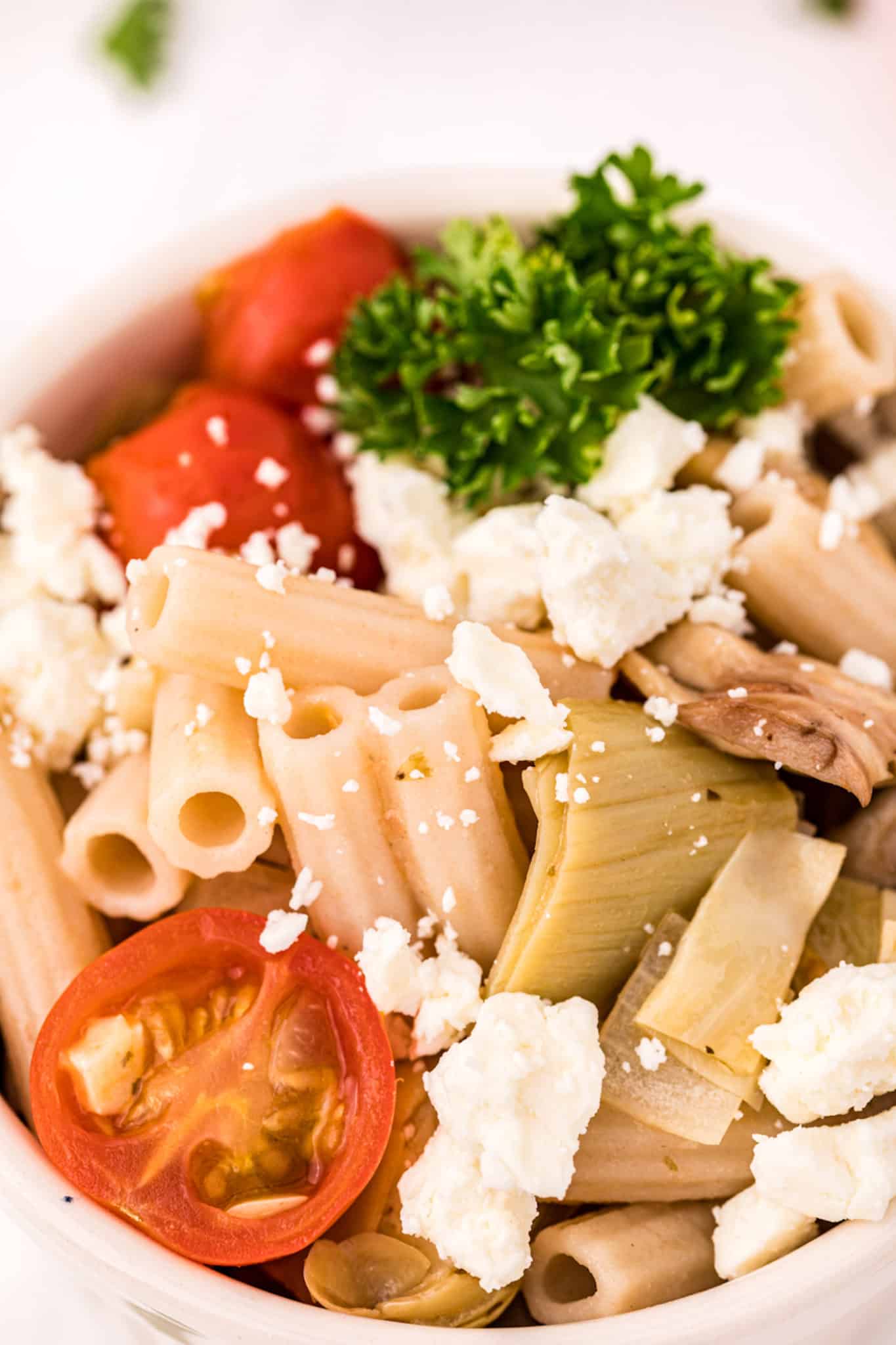 gluten-free pasta salad with veggies and cheese.