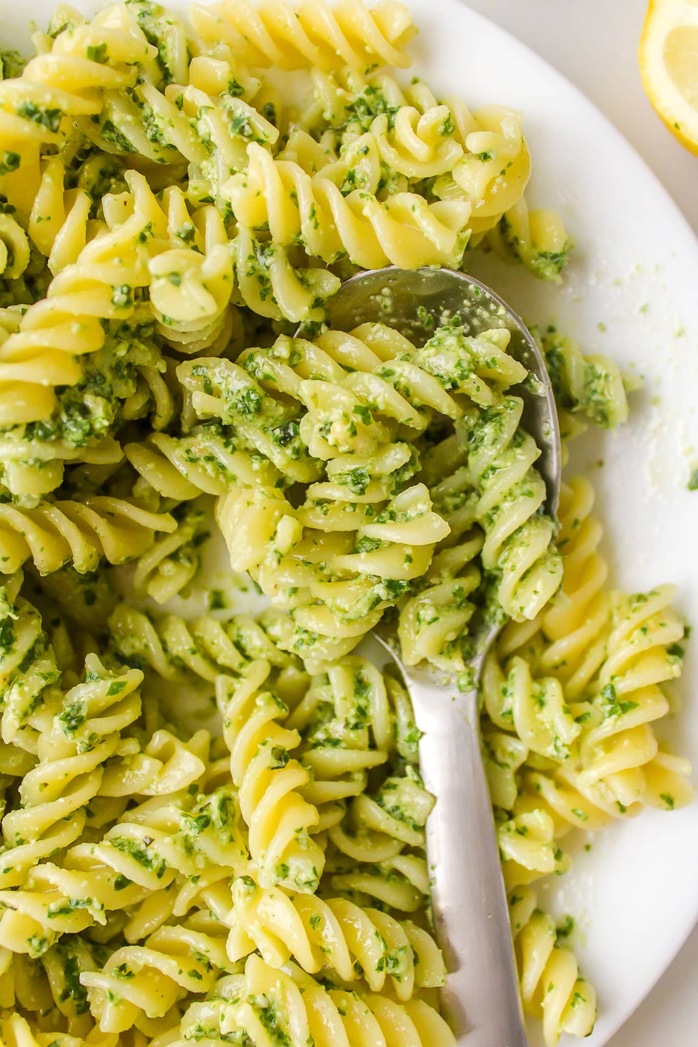 up close picture of the texture of this dairy-free pesto pasta dish.