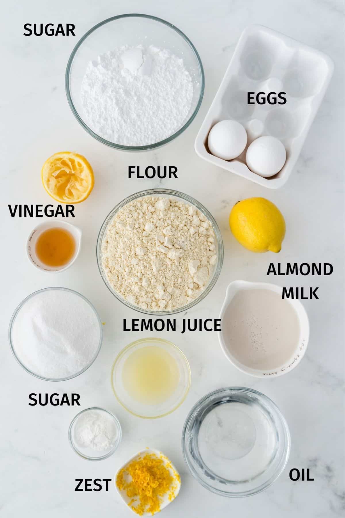 photo with labeled ingredients for gluten free lemon drizzle cake.