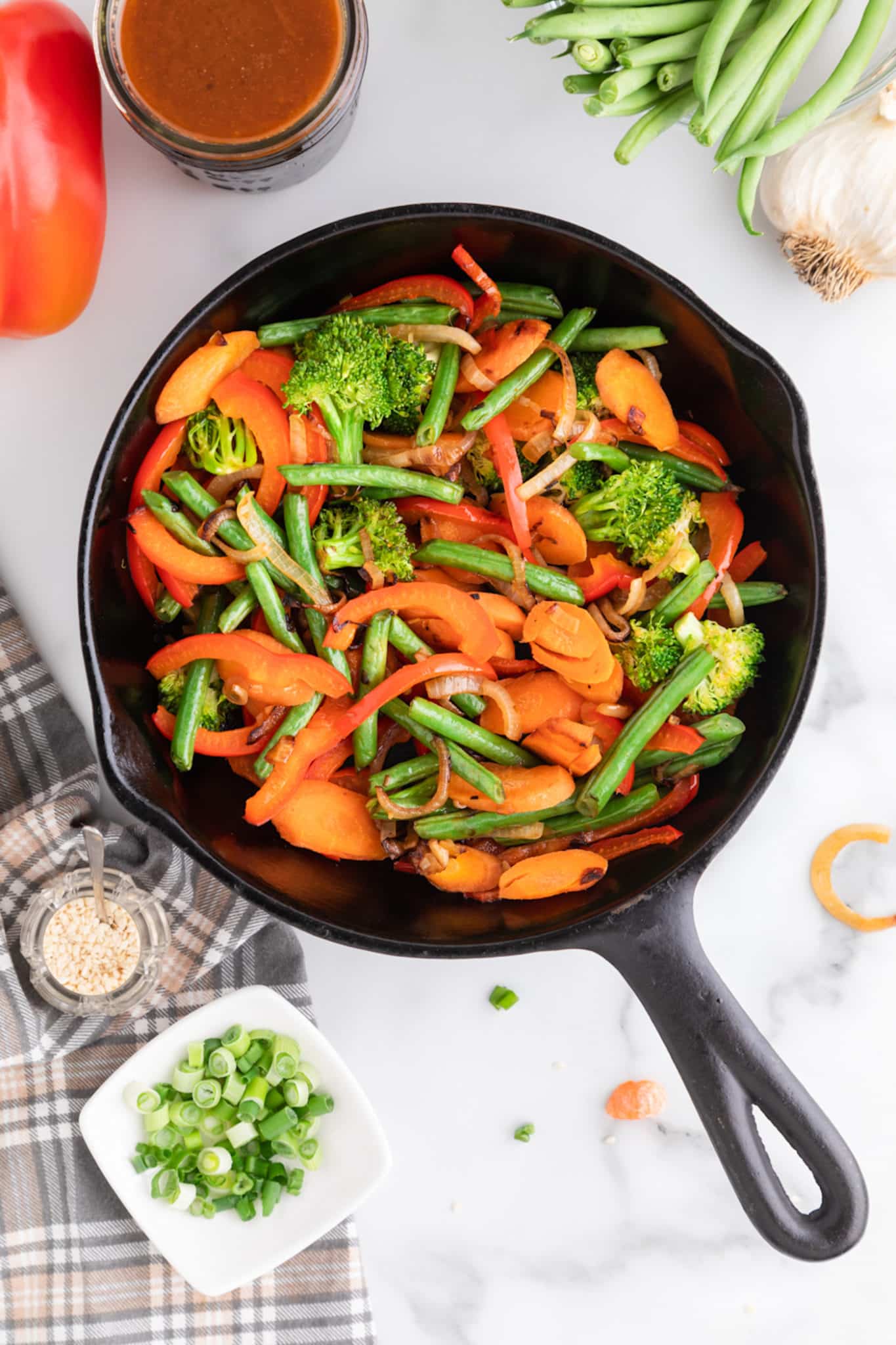 skillet with veggies ready for gluten-free stir fry sauce.