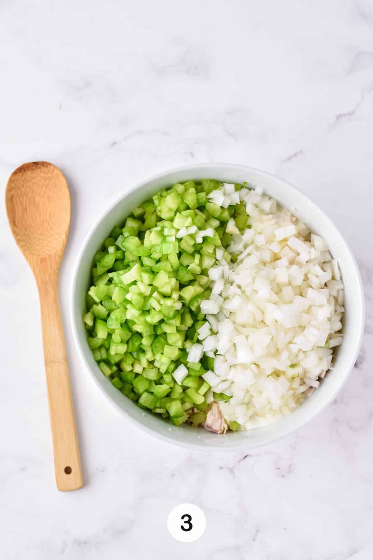chopped celery and onion for chicken salad.